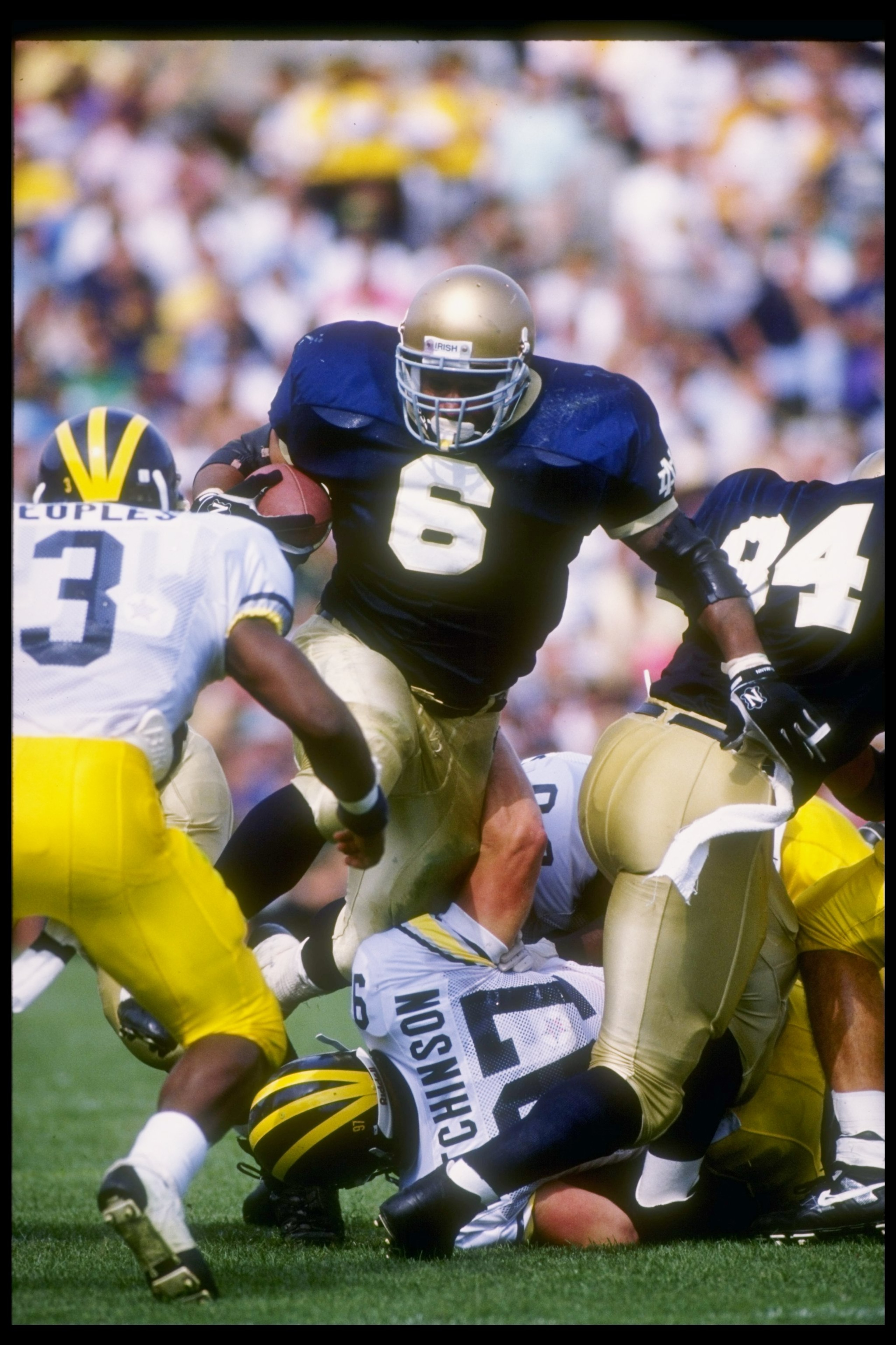 12 Sep 1992:  Fullback Jerome Bettis of the Notre Dame Fighting Irish tries to break through the Michigan Wolverines line during a game at Notre Dame Stadium in South Bend, Indiana.  Notre Dame won the game 17-17. Mandatory Credit: Jonathan Daniel  /Allsp