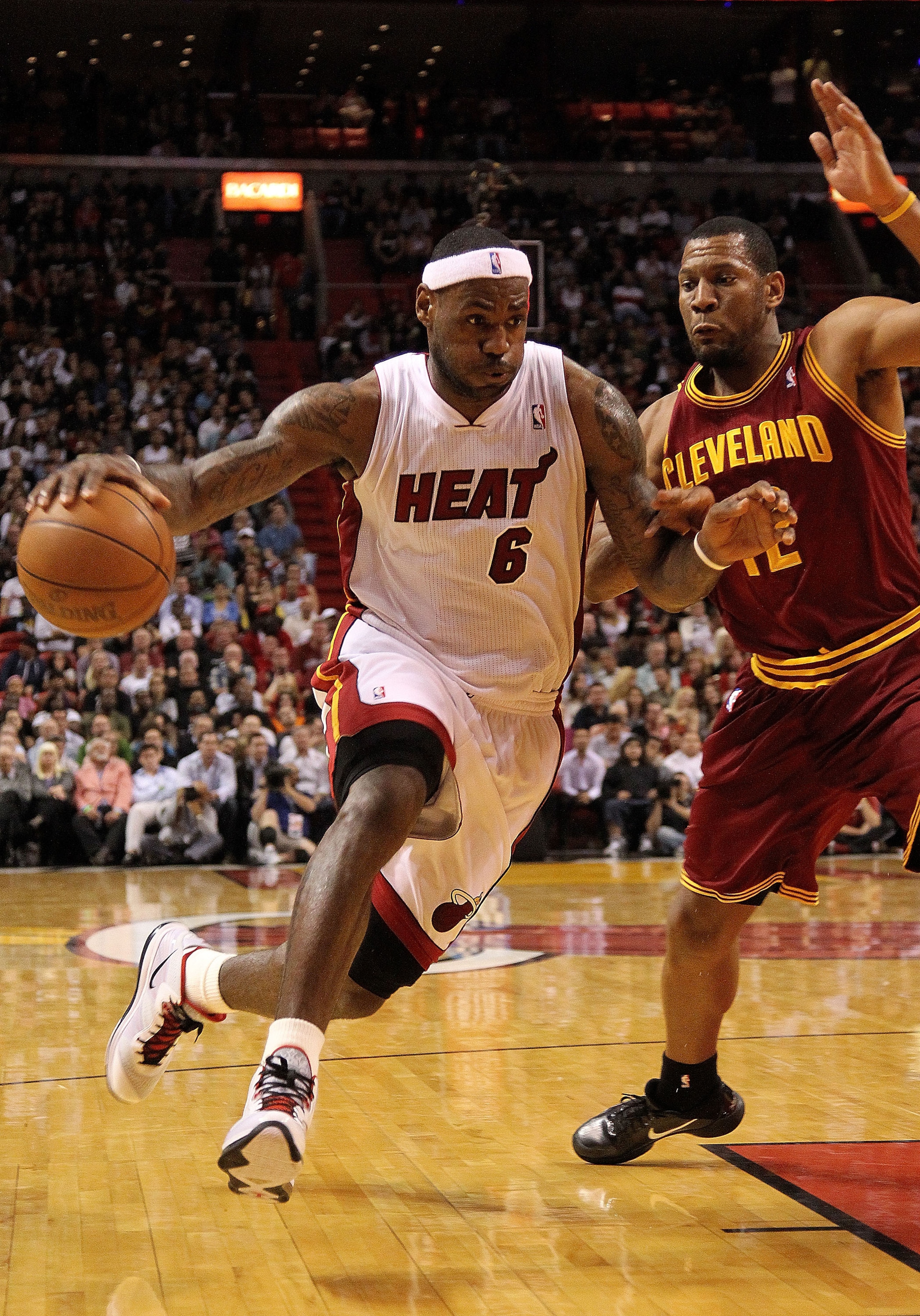 MIAMI, FL - JANUARY 31:  LeBron James #6 of the Miami Heat drives the lane during a game against the Cleveland Cavaliers at American Airlines Arena on January 31, 2011 in Miami, Florida. NOTE TO USER: User expressly acknowledges and agrees that, by downlo
