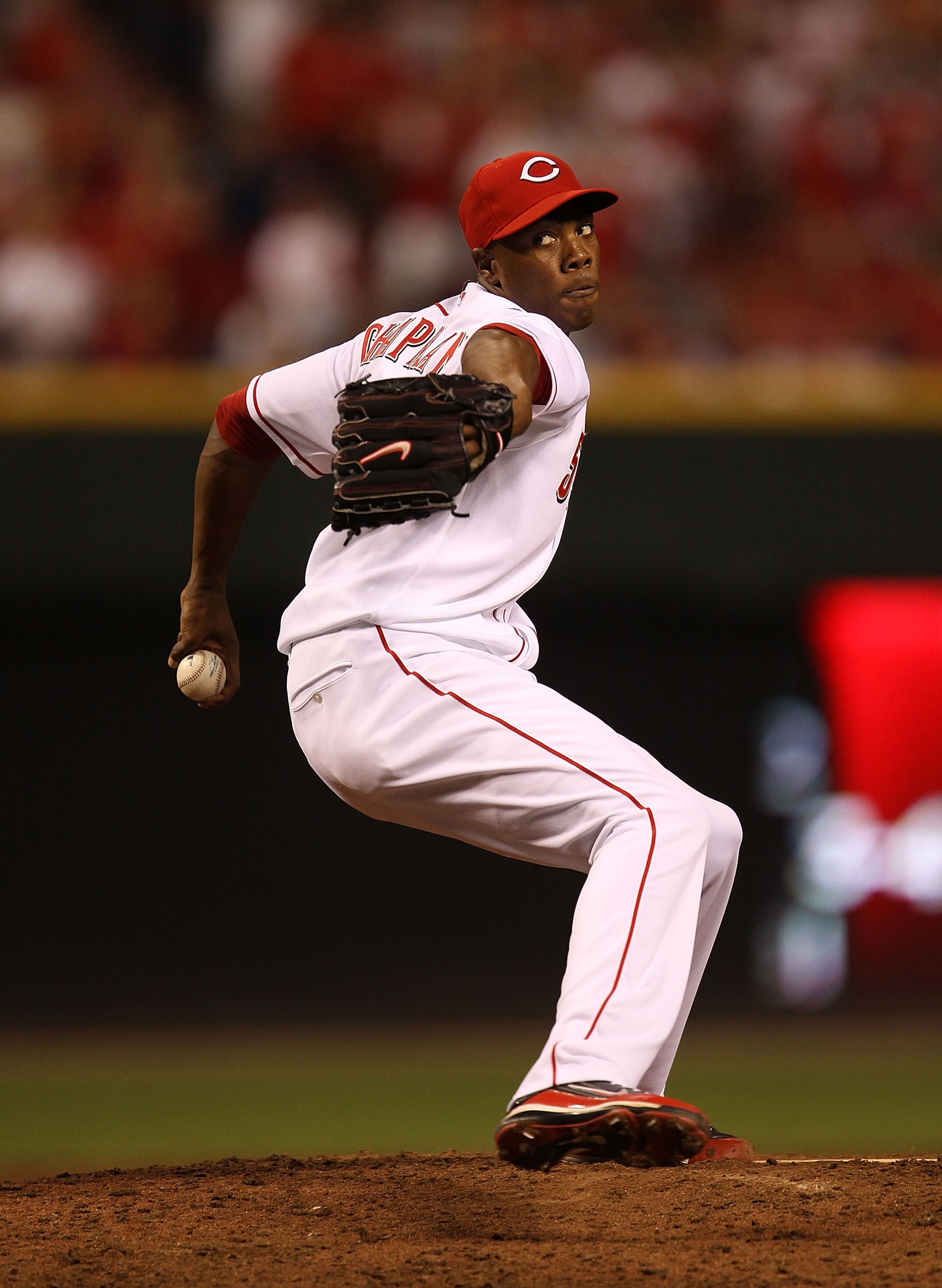 CINCINNATI - OCTOBER 10: Aroldis Chapman #54 of the Cincinnati Reds pitches in the 9th inning against the Philadelphia Phillies during game 3 of the NLDS at Great American Ball Park on October 10, 2010 in Cincinnati, Ohio. The Phillies defeated the Reds 2 CINCINNATI - OCTOBER 10: Aroldis Chapman #54 of the Cincinnati Reds pitches in the 9th inning against the Philadelphia Phillies during game 3 of the NLDS at Great American Ball Park on October 10, 2010 in Cincinnati, Ohio. The Phillies defeated the Reds 2