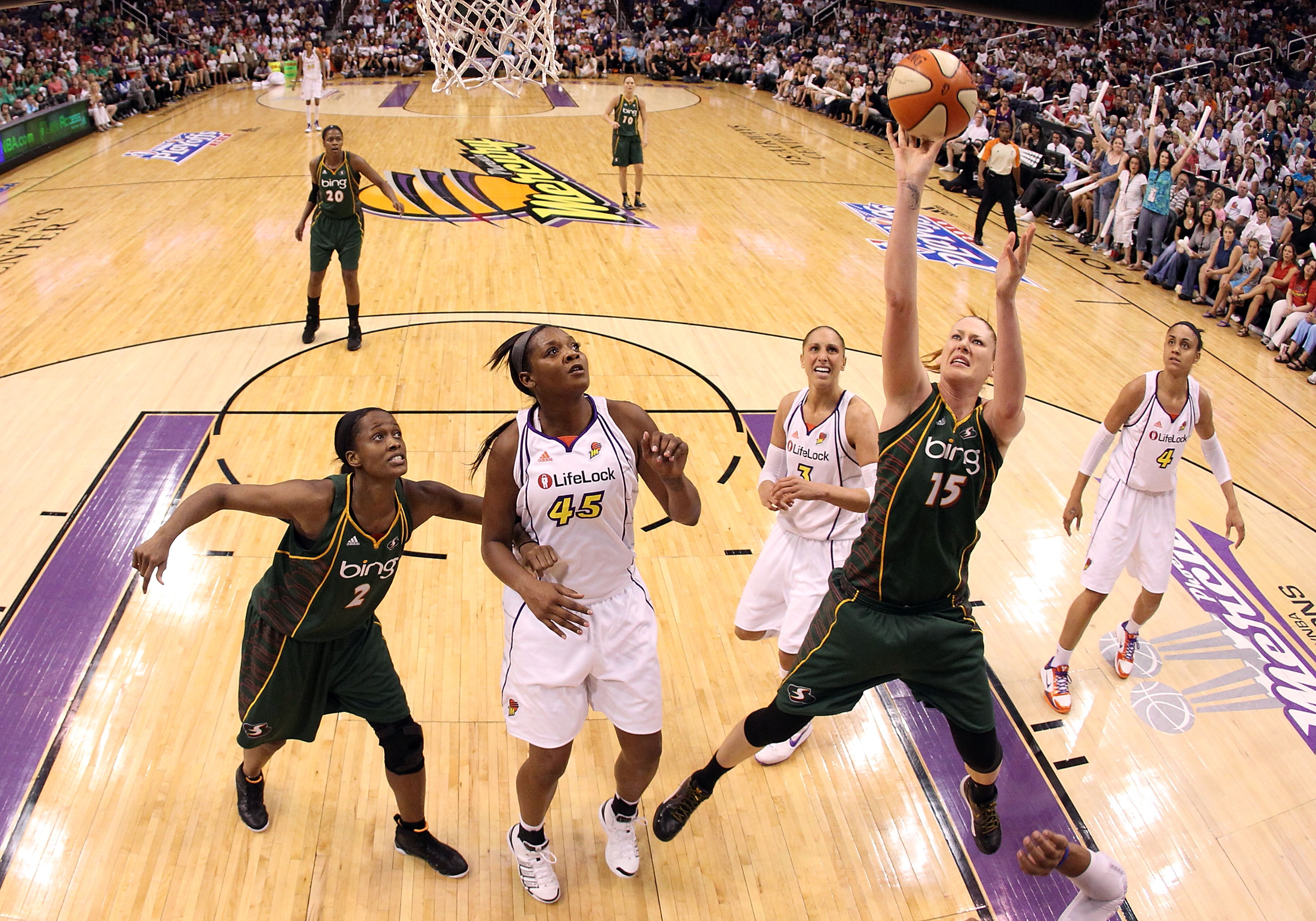 PHOENIX - SEPTEMBER 05:  Lauren Jackson #!5 of the Seattle Storm puts up a shot over Kara Braxton #45 of the Phoenix Mercury in Game Two of the Western Conference Finals during the 2010 WNBA Playoffs at US Airways Center on September 5, 2010 in Phoenix, A