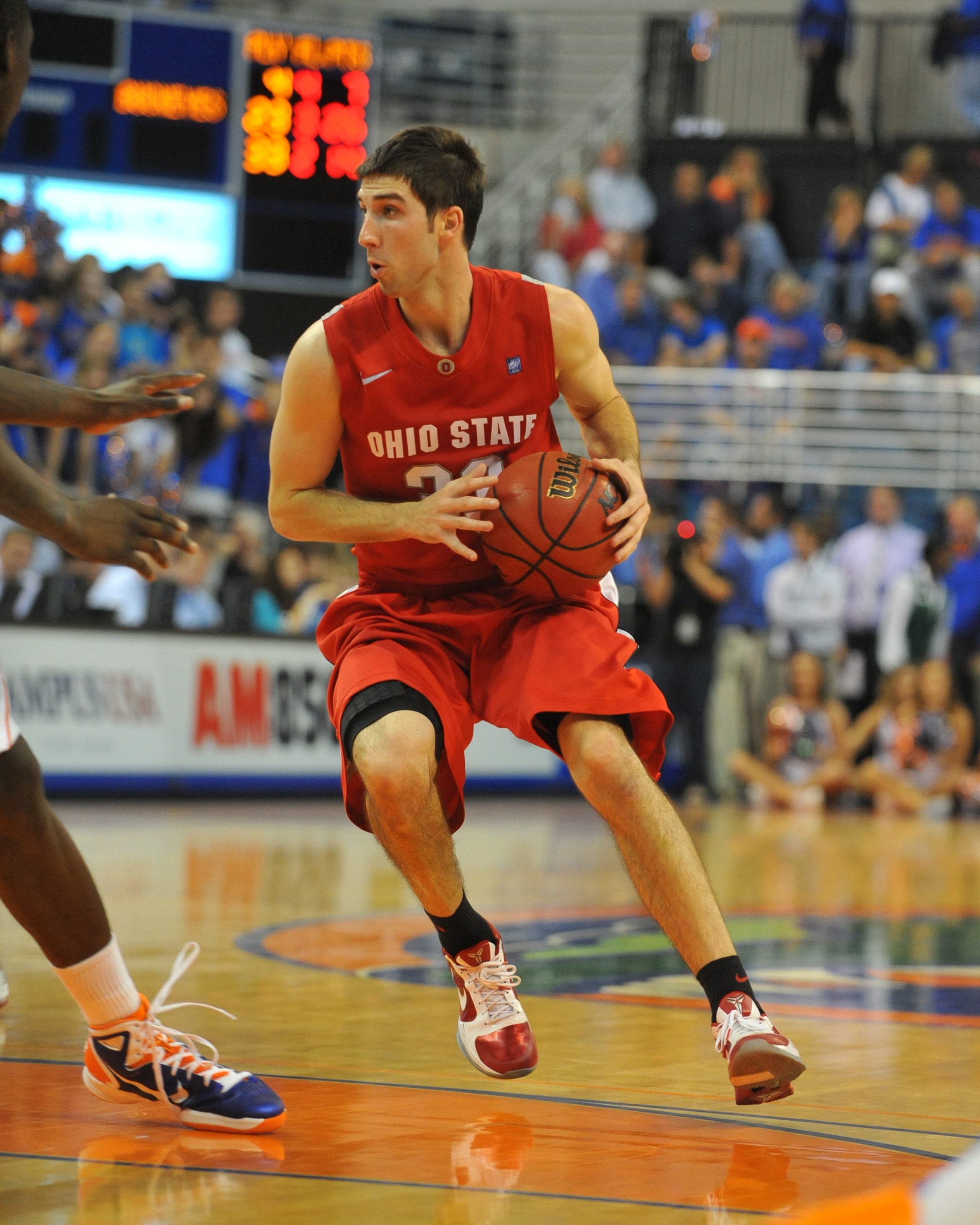 GAINESVILLE, FL - NOVEMBER 16: Guard Jon Diebler #33 of the Ohio State Buckeyes drives against the Florida Gators November 16, 2010 at the Stephen C. O'Connell Center in Gainesville, Florida. (Photo by Al Messerschmidt/Getty Images) GAINESVILLE, FL - NOVEMBER 16: Guard Jon Diebler #33 of the Ohio State Buckeyes drives against the Florida Gators November 16, 2010 at the Stephen C. O'Connell Center in Gainesville, Florida. (Photo by Al Messerschmidt/Getty Images)