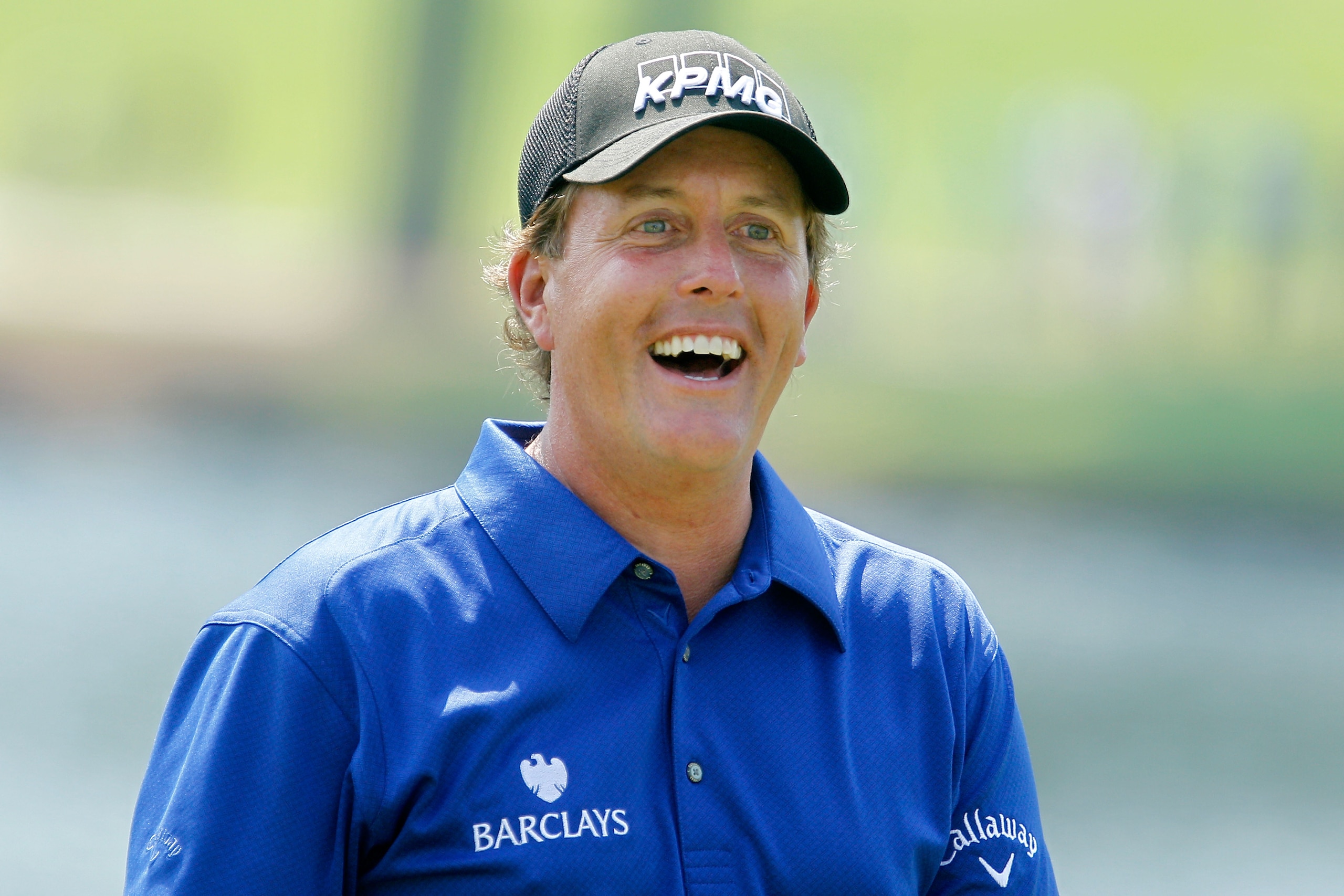 ATLANTA - SEPTEMBER 23: Phil Mickelson smiles while on the practice range prior to playing his first round of THE TOUR Championship presented by Coca-Cola at East Lake Golf Club on September 23, 2010 in Atlanta, Georgia. (Photo by Scott Halleran/Getty I ATLANTA - SEPTEMBER 23: Phil Mickelson smiles while on the practice range prior to playing his first round of THE TOUR Championship presented by Coca-Cola at East Lake Golf Club on September 23, 2010 in Atlanta, Georgia. (Photo by Scott Halleran/Getty I
