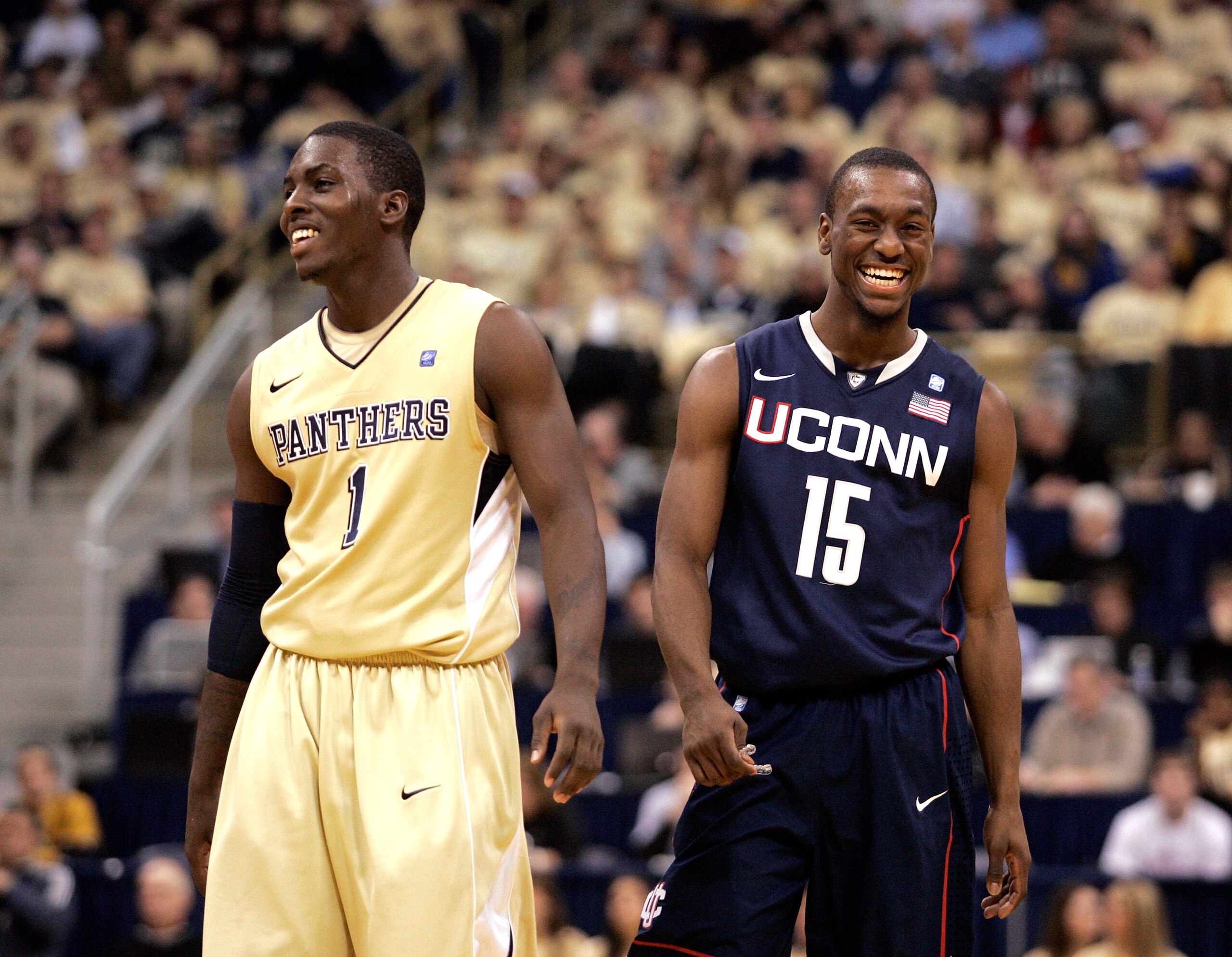 PITTSBURGH, PA - DECEMBER 27: Travon Woodall #1 of the Pittsburgh Panthers and Kemba Walker #15 of the Connecticut Huskies have a laugh at Petersen Events Center on December 27, 2010 in Pittsburgh, Pennsylvania. Pittsburgh defeated Connecticut 78-64. ( PITTSBURGH, PA - DECEMBER 27: Travon Woodall #1 of the Pittsburgh Panthers and Kemba Walker #15 of the Connecticut Huskies have a laugh at Petersen Events Center on December 27, 2010 in Pittsburgh, Pennsylvania. Pittsburgh defeated Connecticut 78-64. (
