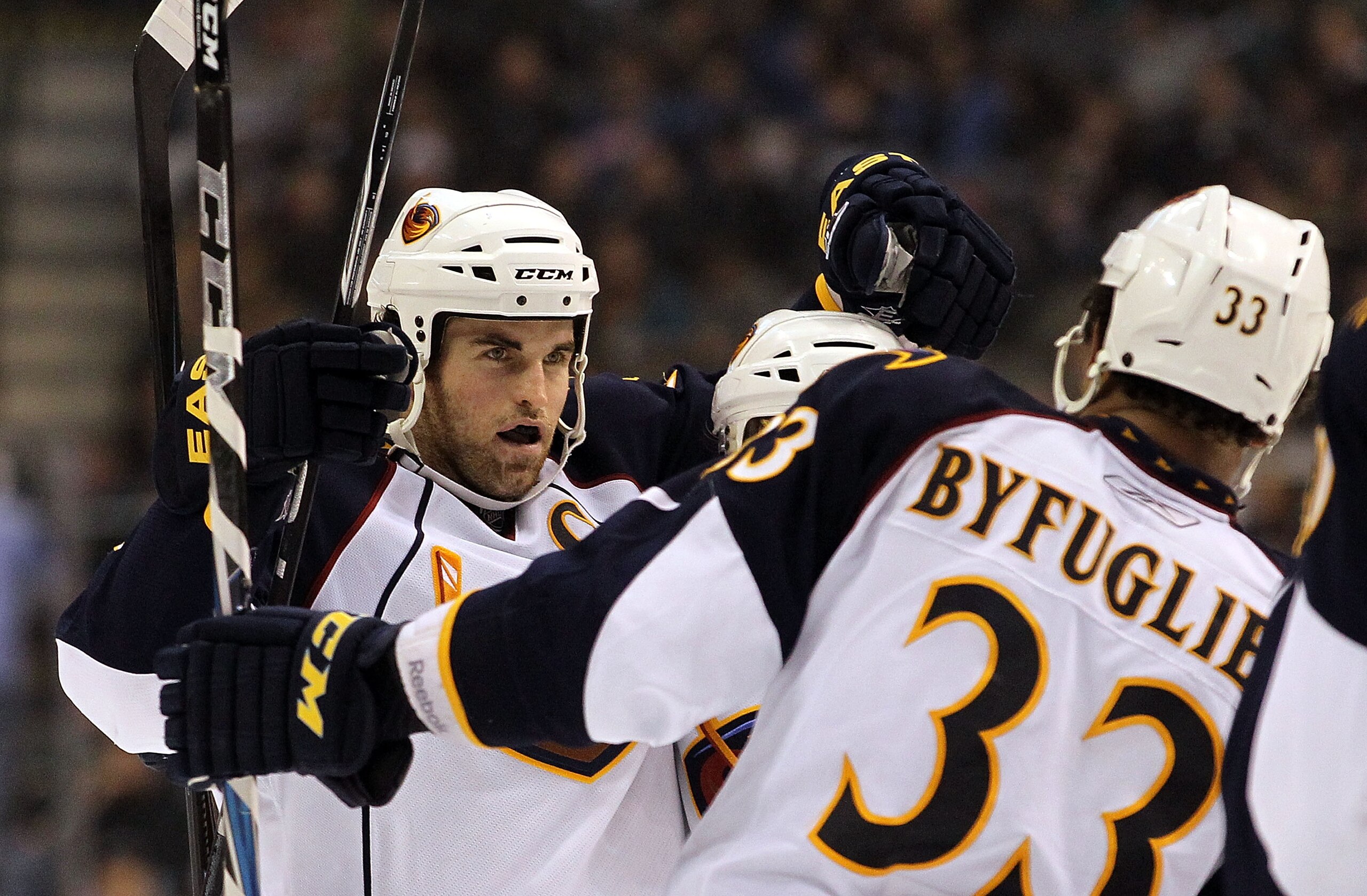 DALLAS, TX - JANUARY 15:  Andrew Ladd #16 celebrates his goal with Dustin Byfuglien #3 of the Atlanta Thrashers during play against the Dallas Stars at American Airlines Center on January 15, 2011 in Dallas, Texas.  (Photo by Ronald Martinez/Getty Images)