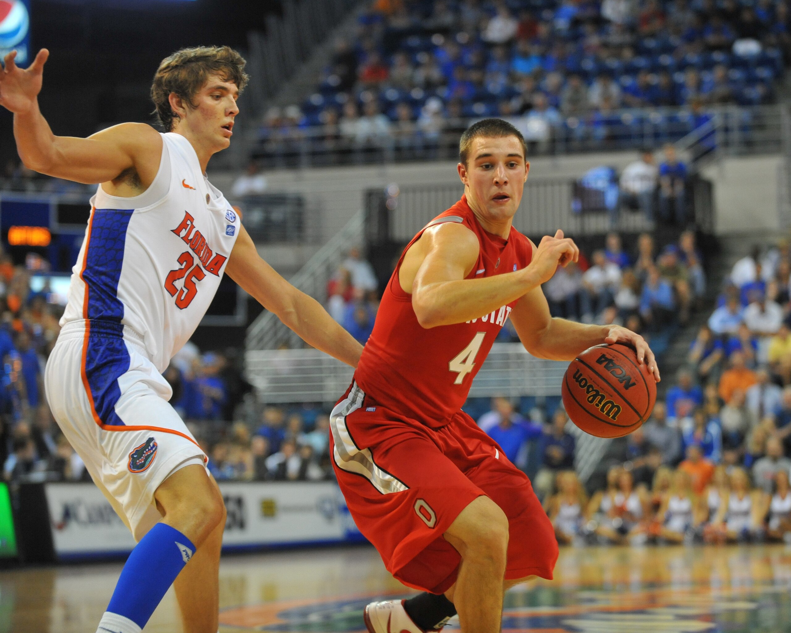 GAINESVILLE, FL - NOVEMBER 16: Guard Aaron Craft #4 of the Ohio State Buckeyes drives up court against the Florida Gators November 16, 2010 at the Stephen C. O'Connell Center in Gainesville, Florida. (Photo by Al Messerschmidt/Getty Images) GAINESVILLE, FL - NOVEMBER 16: Guard Aaron Craft #4 of the Ohio State Buckeyes drives up court against the Florida Gators November 16, 2010 at the Stephen C. O'Connell Center in Gainesville, Florida. (Photo by Al Messerschmidt/Getty Images)