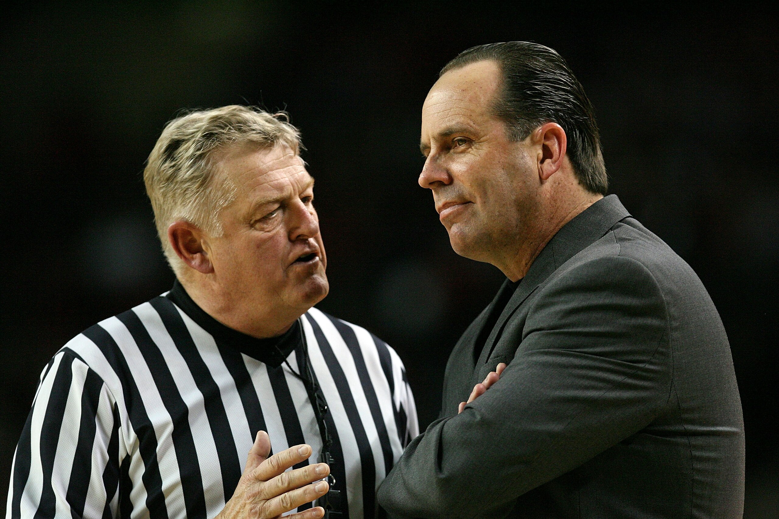 LOUISVILLE, KY - JANUARY 12: Game official Jim Burr talks with Mike Brey, the Head Coach of the Notre Dame Fighting Irish, during the Big East Conference game against the Louisville Cardinals on January 12, 2009 at Freedom Hall in Louisville, Kentucky. ( LOUISVILLE, KY - JANUARY 12: Game official Jim Burr talks with Mike Brey, the Head Coach of the Notre Dame Fighting Irish, during the Big East Conference game against the Louisville Cardinals on January 12, 2009 at Freedom Hall in Louisville, Kentucky. (