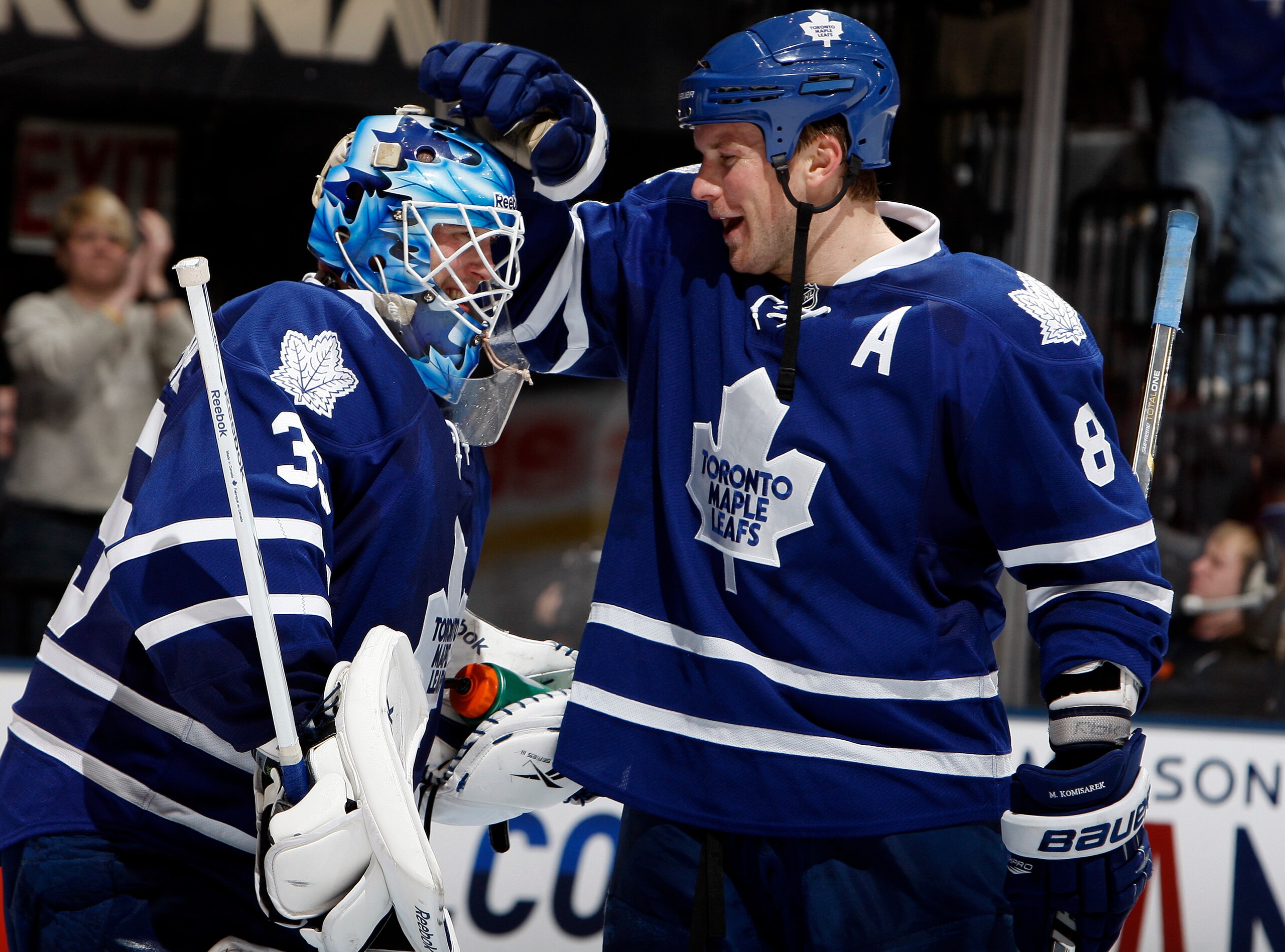 TORONTO, CANADA - FEBRUARY 1: Jean-Sebastien Giguere #35 and Mike Komisarek #8 of the Toronto Maple Leafs celebrate after stopping Christopher Higgins of the Florida Panthers to win the shootout at the Air Canada Centre February 1, 2011 in Toronto, Ontar TORONTO, CANADA - FEBRUARY 1: Jean-Sebastien Giguere #35 and Mike Komisarek #8 of the Toronto Maple Leafs celebrate after stopping Christopher Higgins of the Florida Panthers to win the shootout at the Air Canada Centre February 1, 2011 in Toronto, Ontar