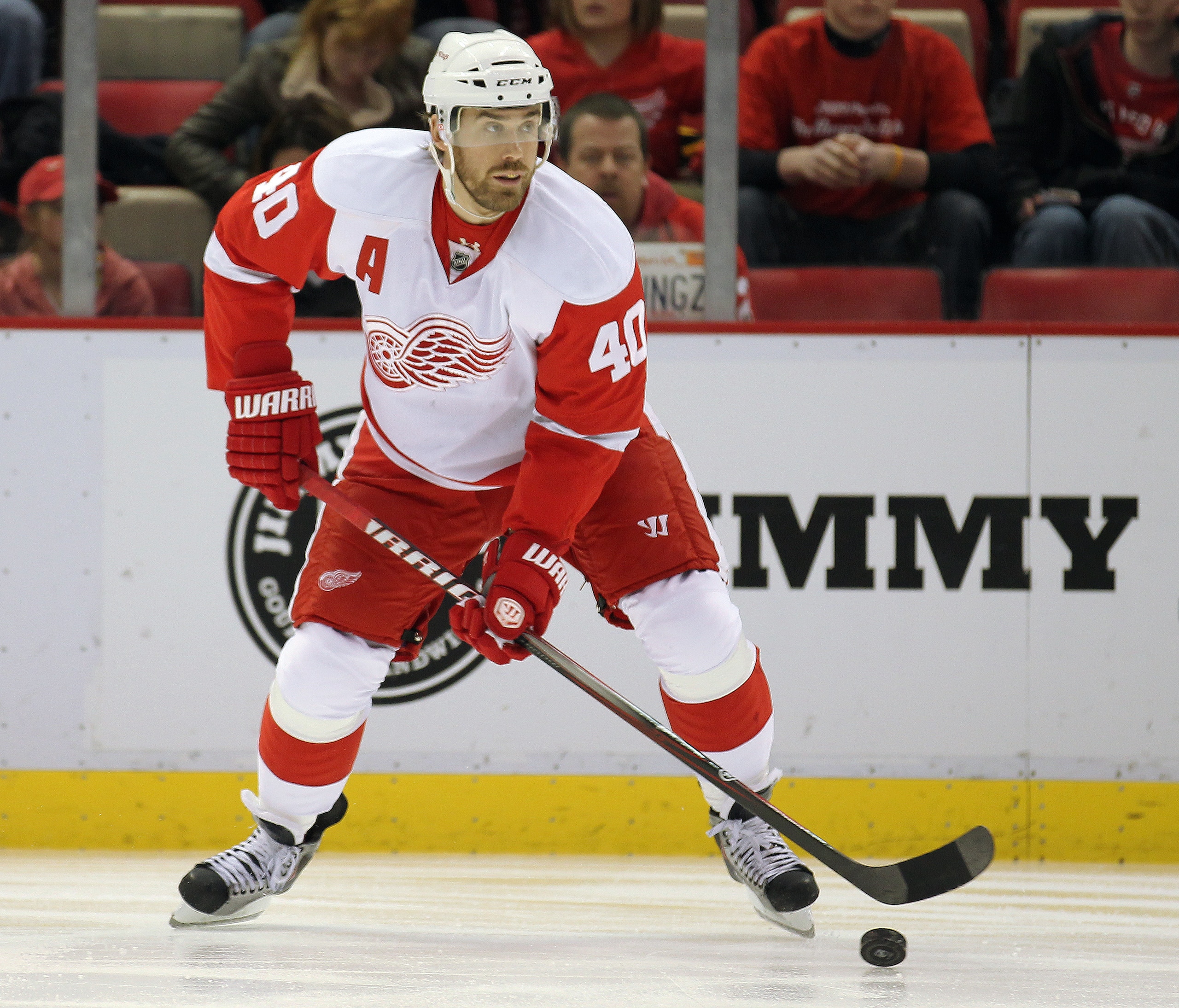 DETROIT, MI - JANUARY 22:  Henrik Zetterberg #40 of the Detroit Red Wings handles the puck in a game against the Chicago Black Hawks on January 22, 2011 at the Joe Louis Arena in Detroit, Michigan. The Hawks defeated the Wings 4-1. (Photo by Claus Anderse