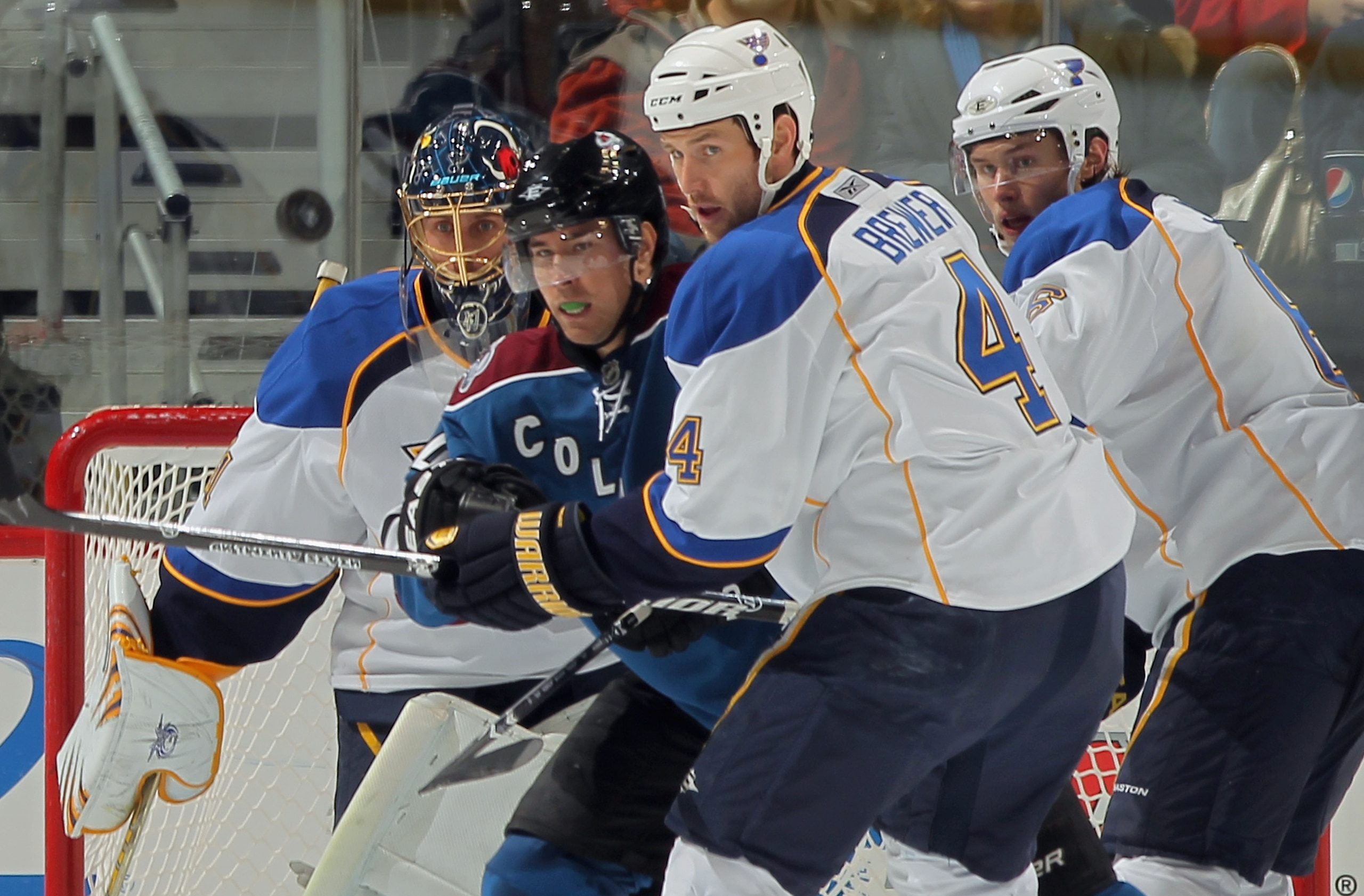 DENVER - NOVEMBER 15:  Goalie Jaroslav Halak #41 of the St. Louis Blues defends the goal as Daniel Winnik #34 of the Colorado Avalanche, Eric Brewer #4 and Erik Johnson #6 of the Blues keep their eyes on the puck at the Pepsi Center on November 15, 2010 i