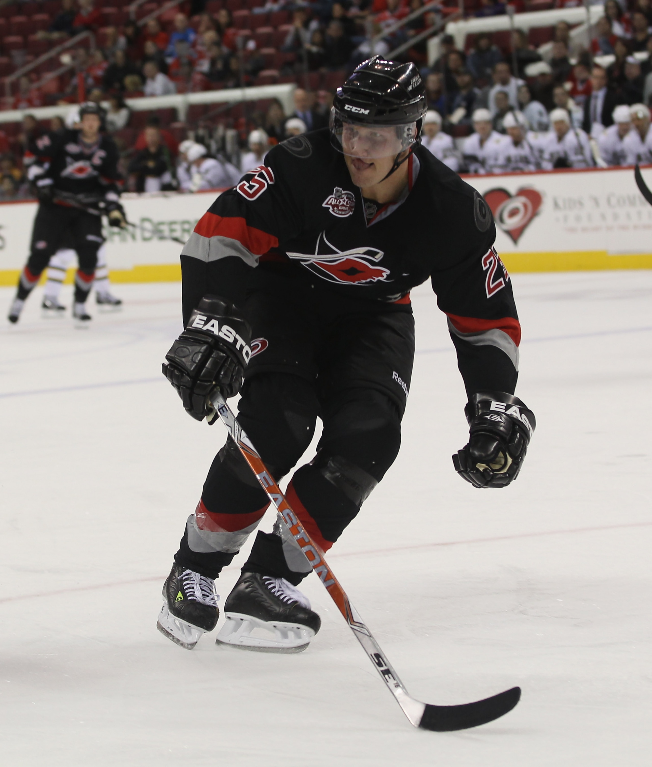 RALEIGH, NC - NOVEMBER 29:  Joni Pitkanen #25 of the Carolina Hurricanes skates against the Dallas Stars at the RBC Center on November 29, 2010 in Raleigh, North Carolina. The Stars defeated the Hurricanes 4-1.  (Photo by Bruce Bennett/Getty Images)