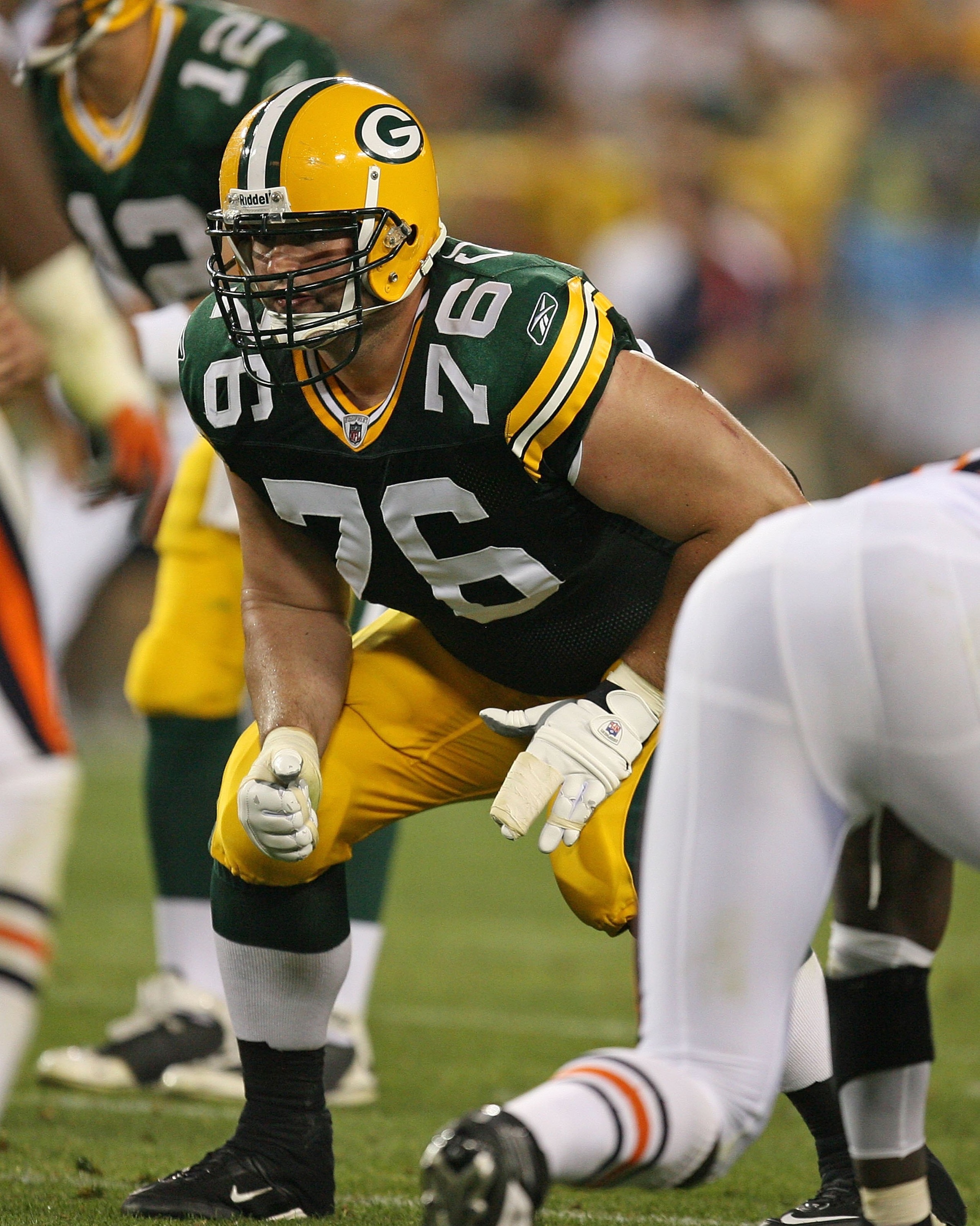GREEN BAY, WI - SEPTEMBER 13: Chad Clifton #76 of the Green Bay Packers awaits the start of a play against the Chicago Bears on September 13, 2009 at Lambeau Field in Green Bay, Wisconsin. The Packers defeated the Bears 21-15. (Photo by Jonathan Daniel/Ge GREEN BAY, WI - SEPTEMBER 13: Chad Clifton #76 of the Green Bay Packers awaits the start of a play against the Chicago Bears on September 13, 2009 at Lambeau Field in Green Bay, Wisconsin. The Packers defeated the Bears 21-15. (Photo by Jonathan Daniel/Ge