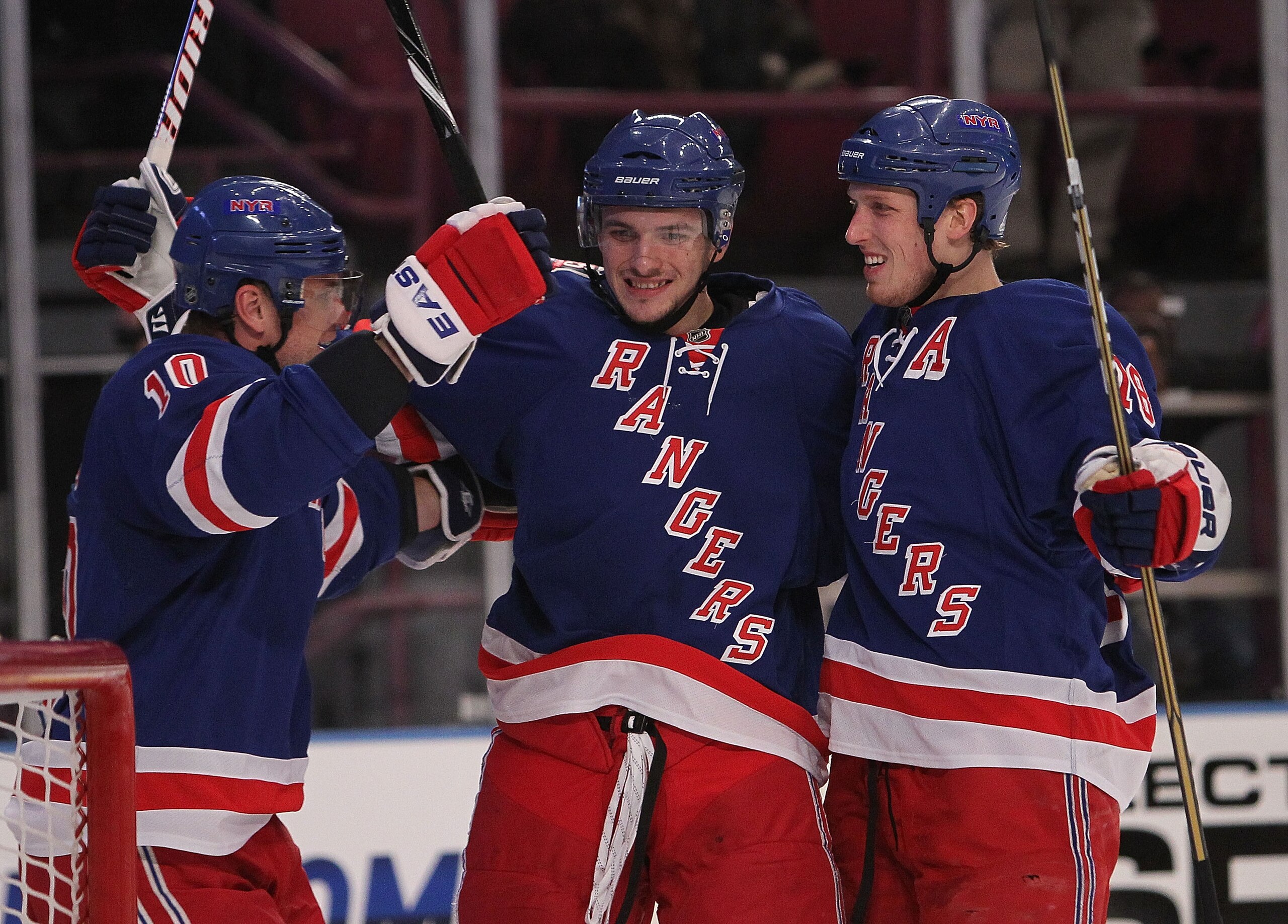 NEW YORK, NY - FEBRUARY 01:  Marc Staal #18 (R) of the New York Rangers and Marian Gaborik #10 (L) congratulate teammate Artem Anisimov #42 (C) after his goal against the Pittsburgh Penguins at Madison Square Garden on February 1, 2011 in New York City.