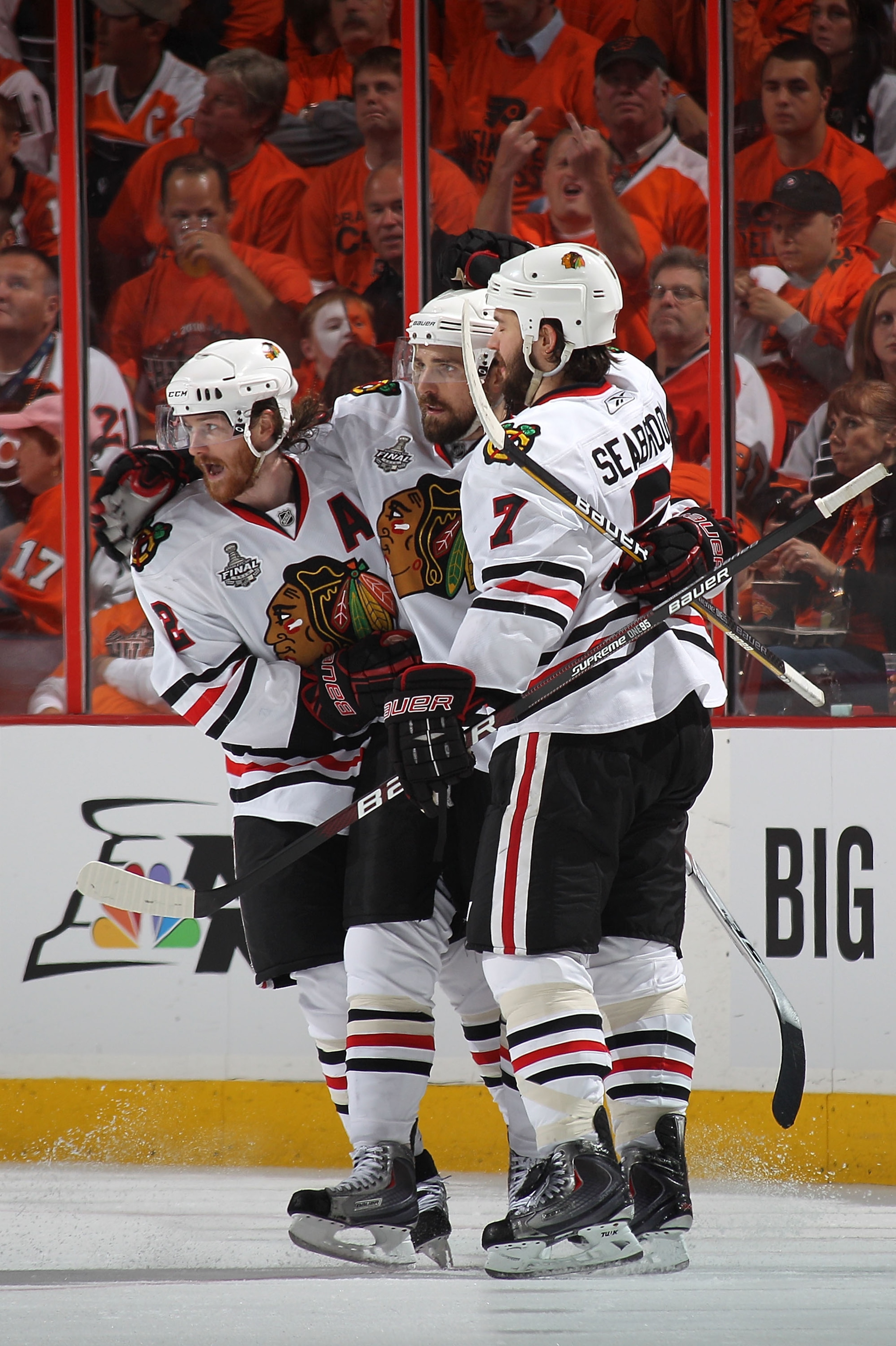 PHILADELPHIA - JUNE 09:  Patrick Sharp #10 of the Chicago Blackhawks celebrates with teammates Duncan Keith #2 and Brent Seabrook #7 after scoring a goal in the second period against the Philadelphia Flyers in Game Six of the 2010 NHL Stanley Cup Final at