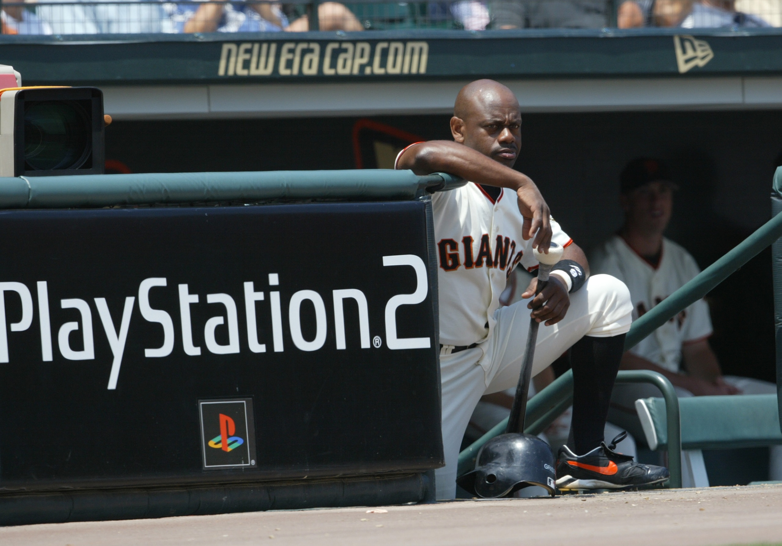 SAN FRANCISCO - JULY 24:  Center fielder Marquis Grissom #9 of the San Francisco Giants waits for his at bat on the steps of the dugout during the National League game against the Arizona Diamondbacks at Pacific Bell Park on July 24, 2003 in San Francisco