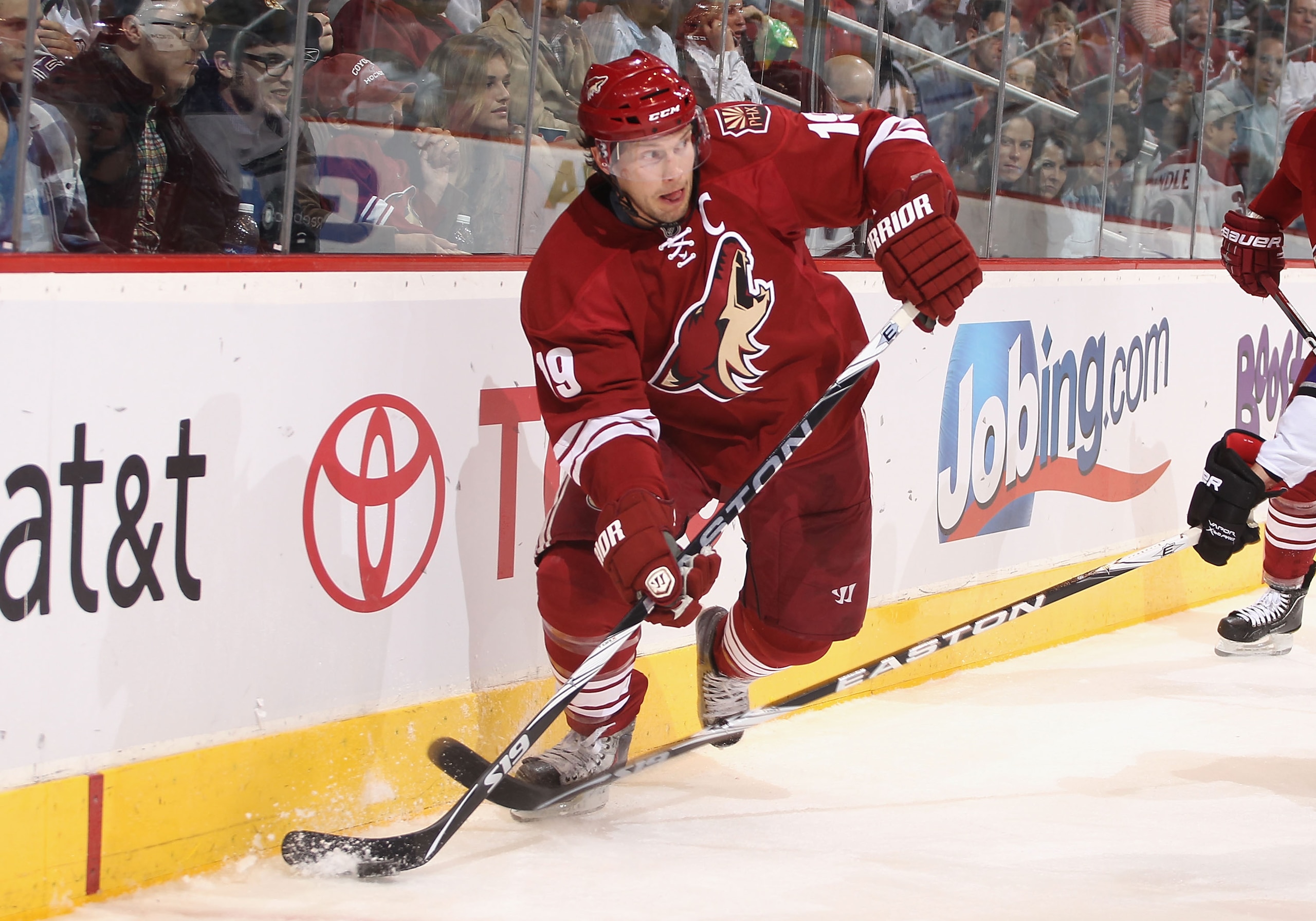 GLENDALE, AZ - JANUARY 22:  Shane Doan #19 of the Phoenix Coyotes skates with the puck during the NHL game at Jobing.com Arena on January 22, 2011 in Glendale, Arizona.  The Kings defeated the Coyotes 4-3.  (Photo by Christian Petersen/Getty Images)