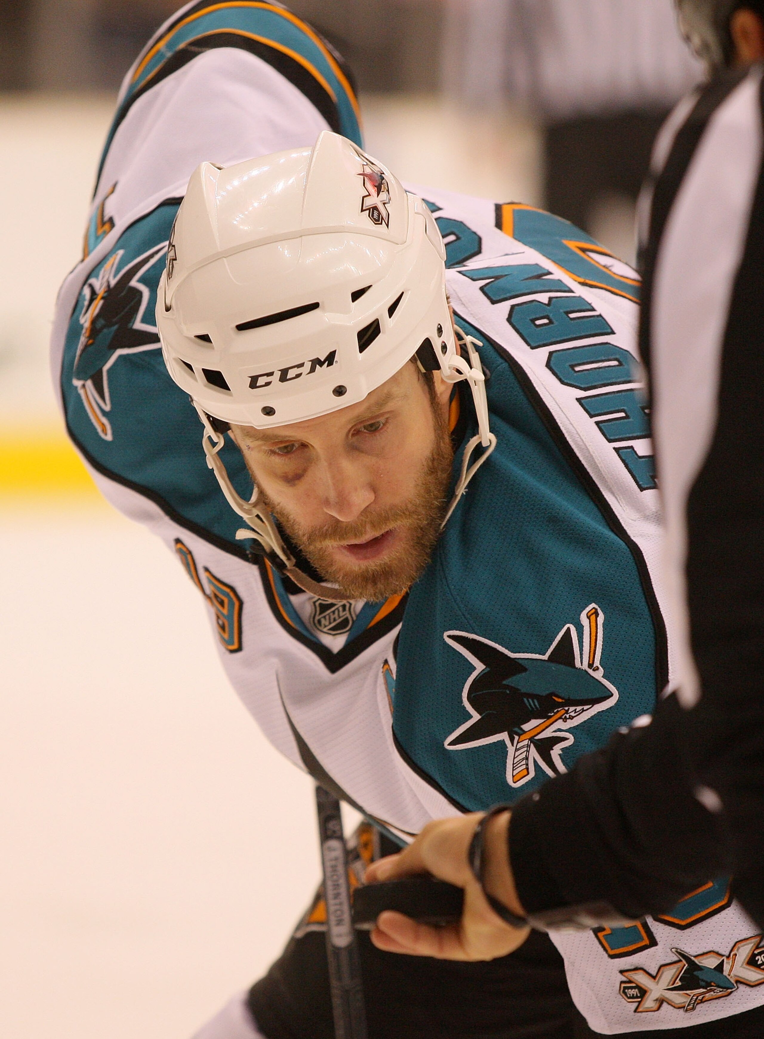 LOS ANGELES, CA - JANUARY 26:  Joe Thornton #19 of the San Jose Sharks waits for the puck to drop against the Los Angeles Kings at Staples Center on January 26, 2011 in Los Angeles, California.  (Photo by Victor Decolongon/Getty Images)