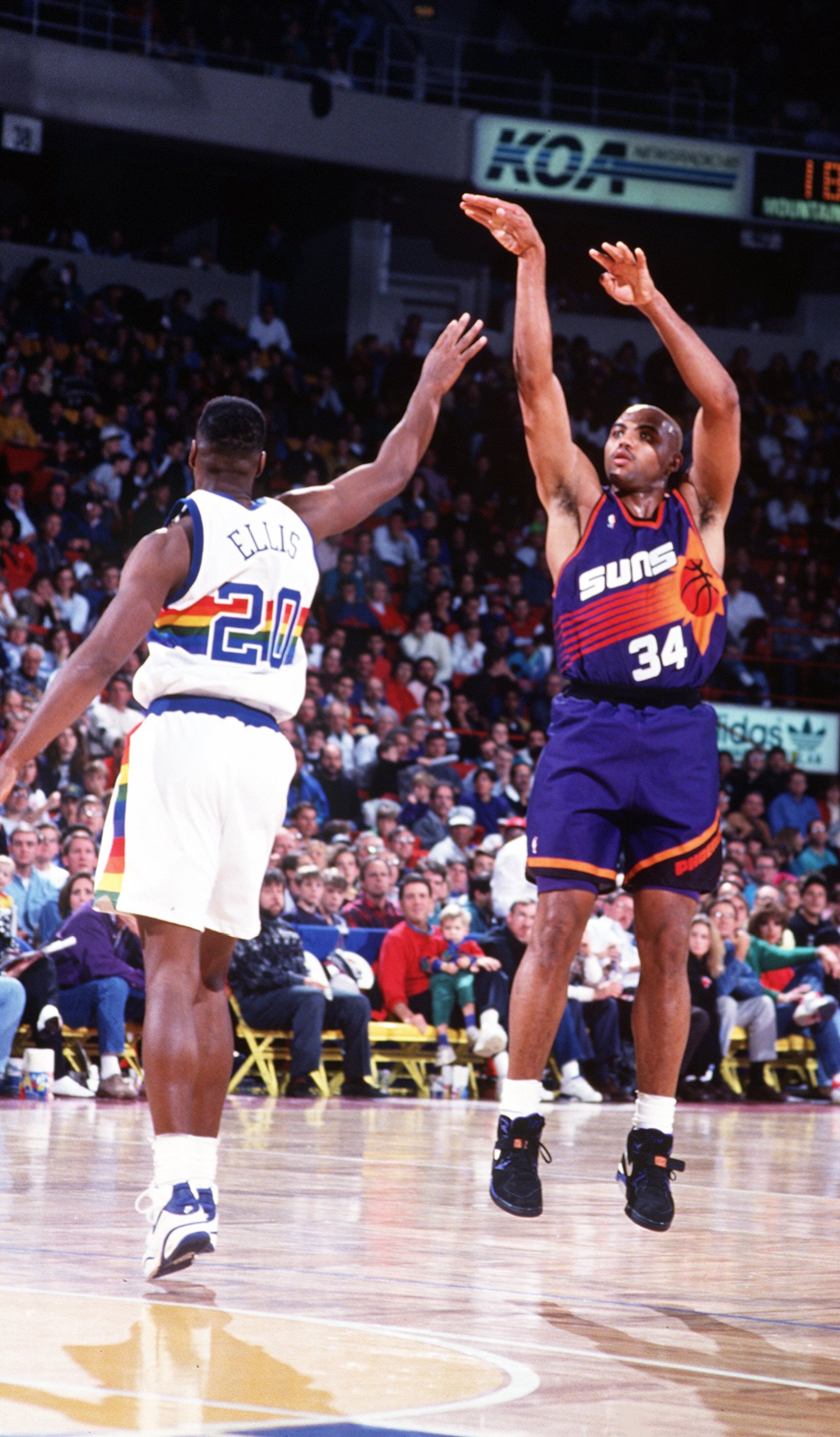 1993: PHOENIX FORWARD CHARLES BARKLEY SHOOTS OVER DENVER FORWARD LAPHONSO ELLIS DURING THE SUNS GAME AGAINST DENVER. Mandatory Credit: Tim Defrisco/ALLSPORT 1993: PHOENIX FORWARD CHARLES BARKLEY SHOOTS OVER DENVER FORWARD LAPHONSO ELLIS DURING THE SUNS GAME AGAINST DENVER. Mandatory Credit: Tim Defrisco/ALLSPORT