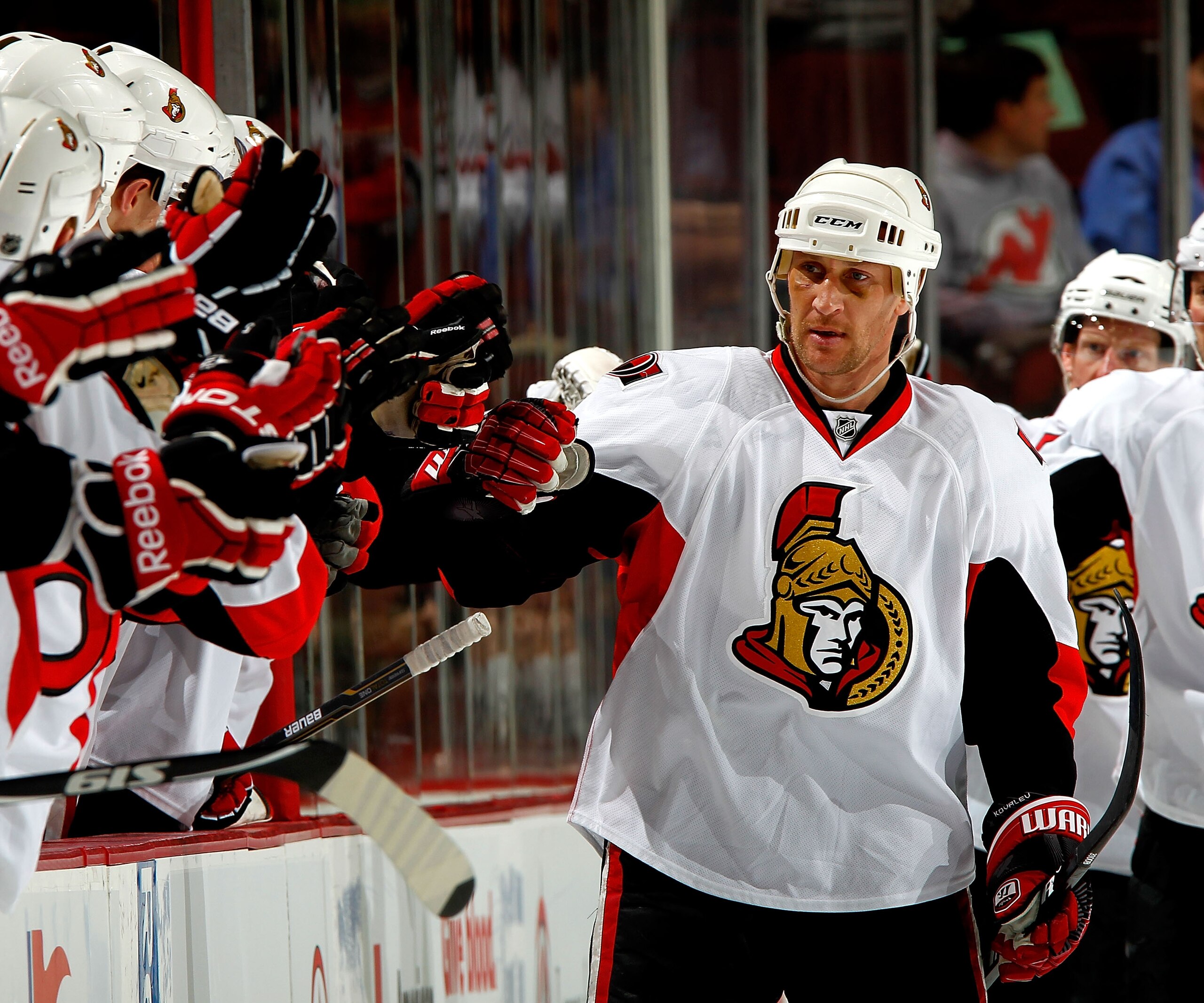 NEWARK, NJ - FEBRUARY 01:  Alex Kovalev #27 of the Ottawa Senators is congratulated by teamates after his goal against the New Jersey Devils during the second period of an NHL hockey game at the Prudential Center on February 1, 2011 in Newark, New Jersey.