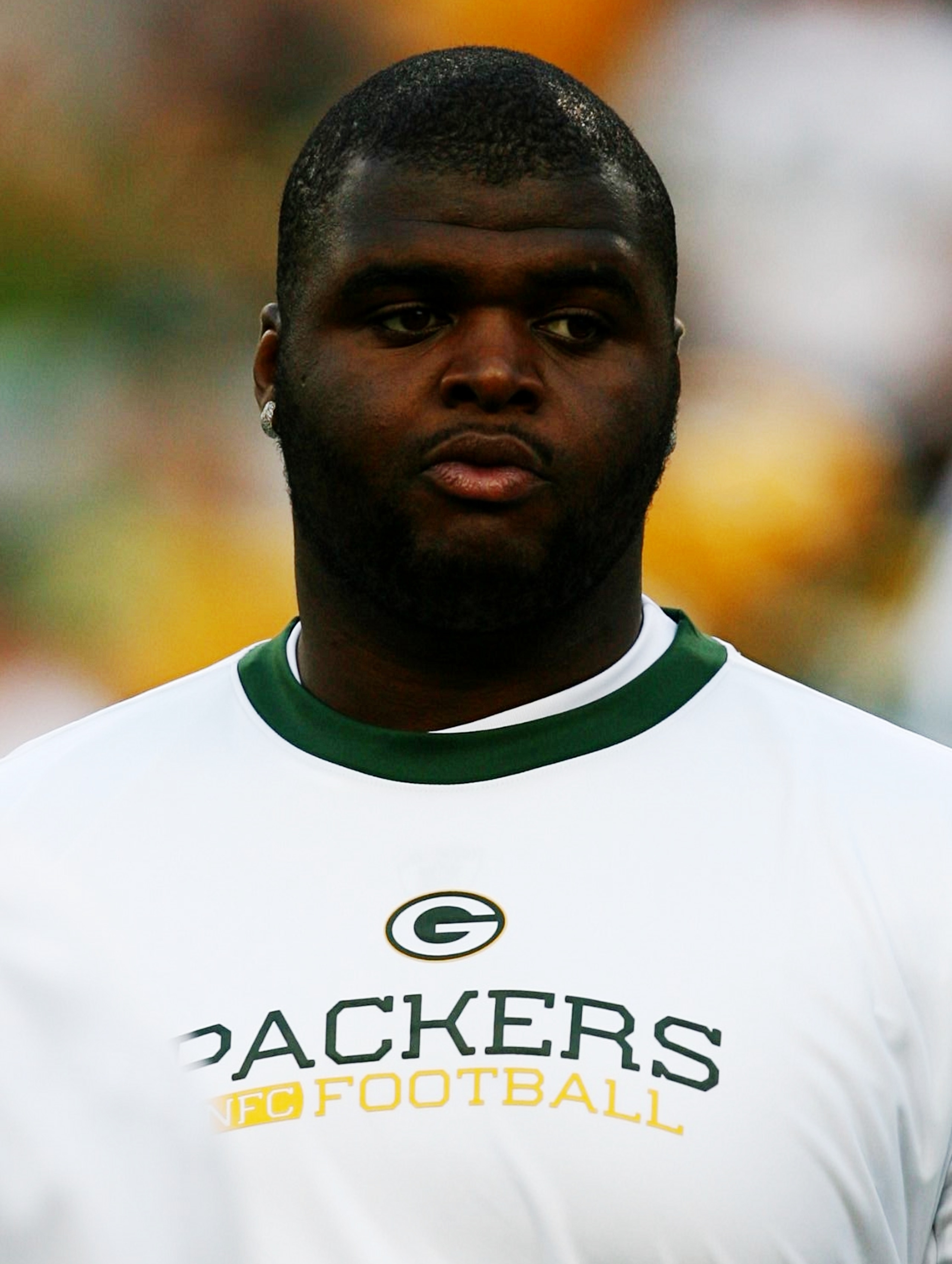 GREEN BAY, WI - AUGUST 15:  Defensive tackle B.J. Raji #90 of the Green Bay Packers looks on during pregame before taking on the Cleveland Browns during the preseason game at Lambeau Field on August 15, 2009 in Green Bay, Wisconsin. Raji will be inactive