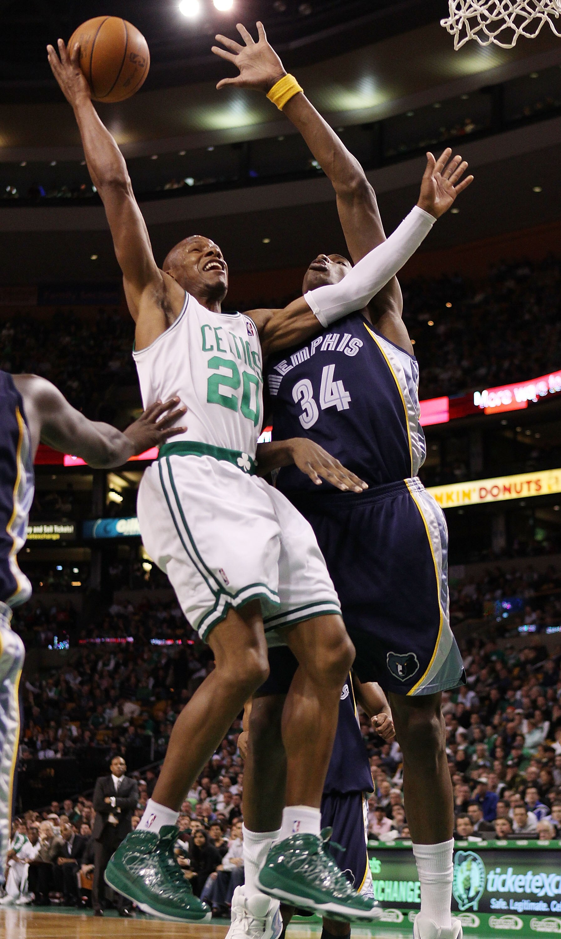 BOSTON - MARCH 10:  Ray Allen #20 of the Boston Celtics takes a shot as Hasheem Thabeet #34 of the Memphis Grizzlies defends on March 10, 2010 at the TD Garden in Boston, Massachusetts. The Grizzlies defeated the Celtics 111-91. NOTE TO USER: User express