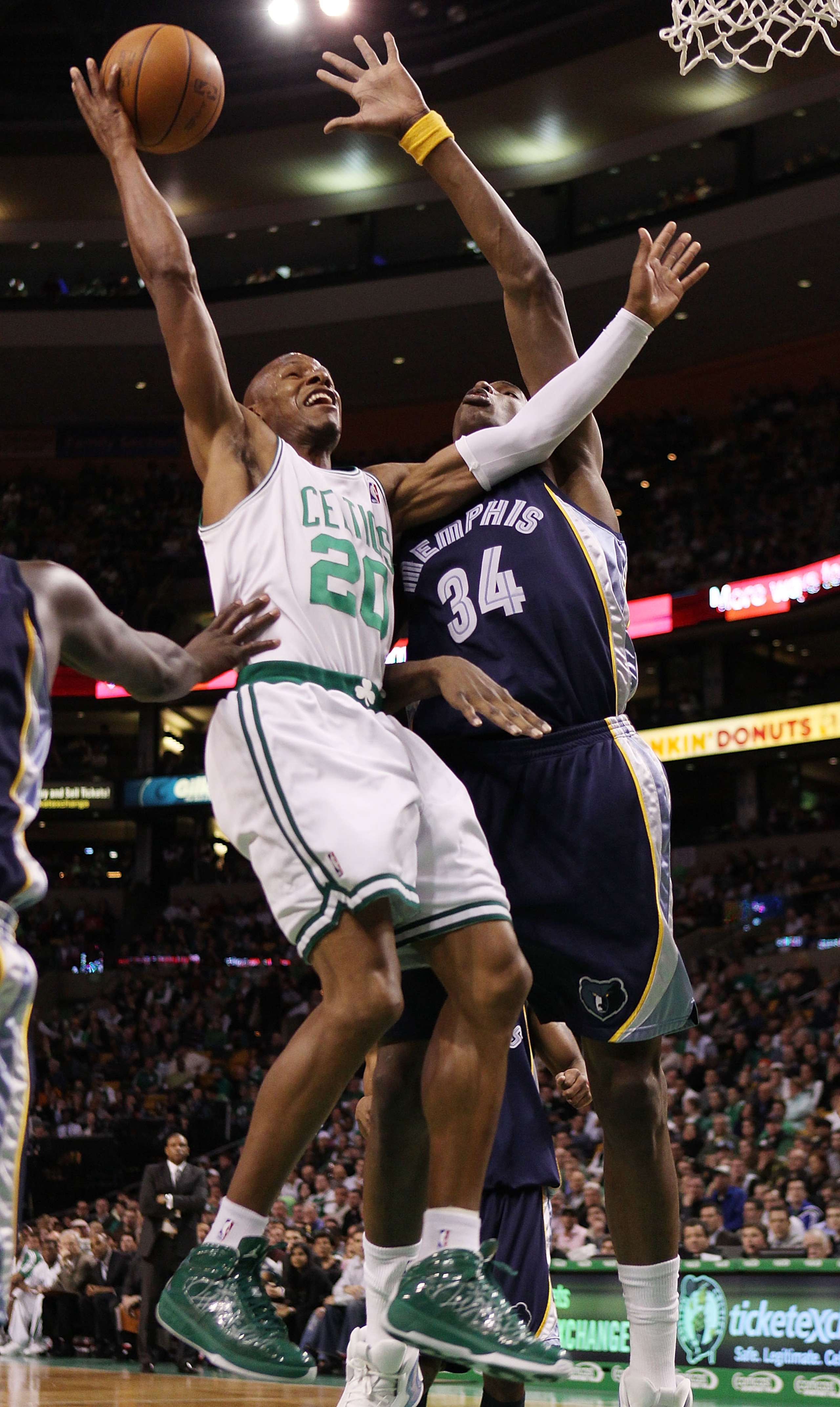 BOSTON - MARCH 10:  Ray Allen #20 of the Boston Celtics takes a shot as Hasheem Thabeet #34 of the Memphis Grizzlies defends on March 10, 2010 at the TD Garden in Boston, Massachusetts. The Grizzlies defeated the Celtics 111-91. NOTE TO USER: User express
