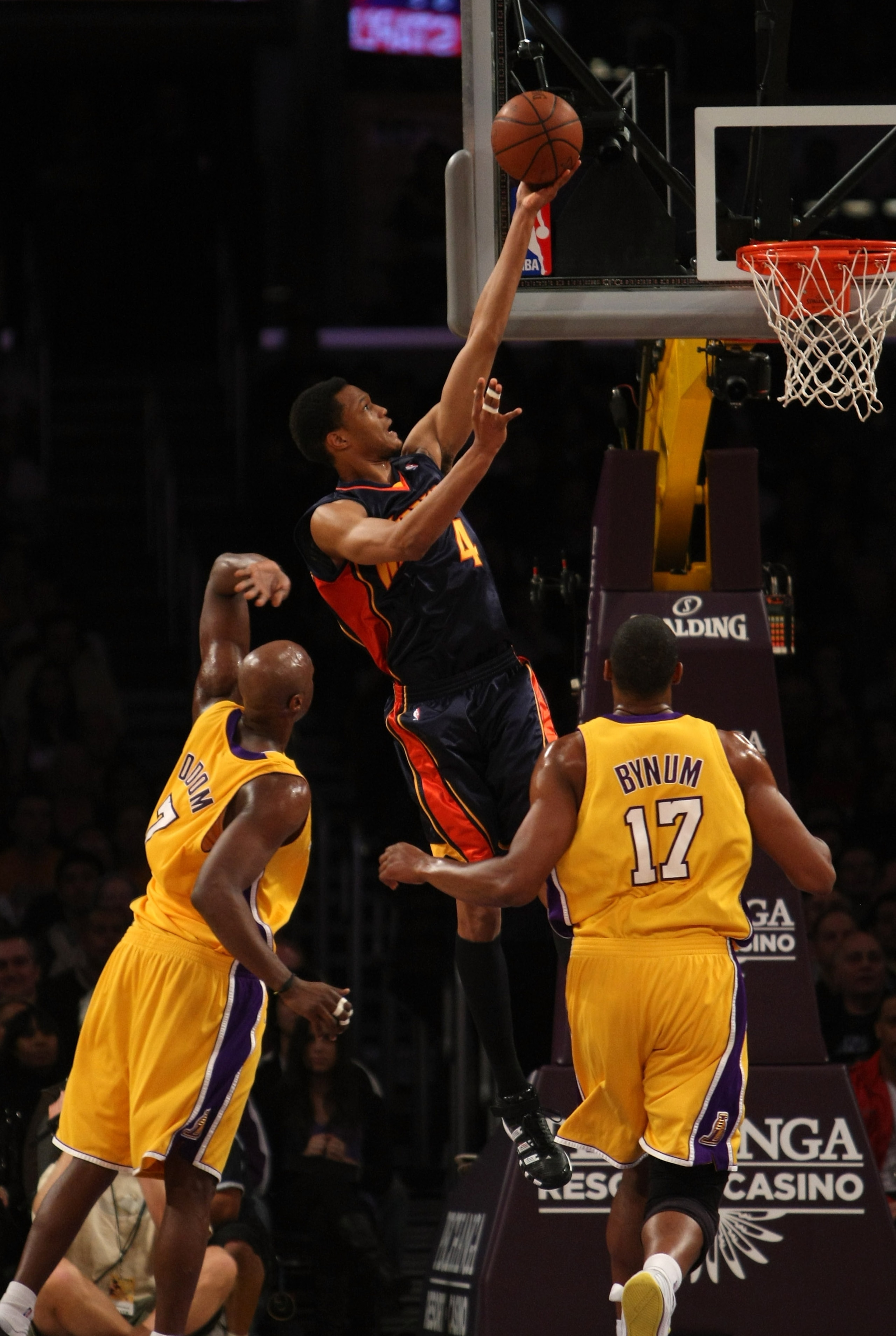 LOS ANGELES - NOVEMBER 15:  Anthony Randolph #4 of the Golden State Warriors shoots over Lamar Odom #7 and Andrew Bynum #16 of the Los Angeles Lakers on December 29, 2009 at Staples Center in Los Angeles, California.  NOTE TO USER: User expressly acknowle