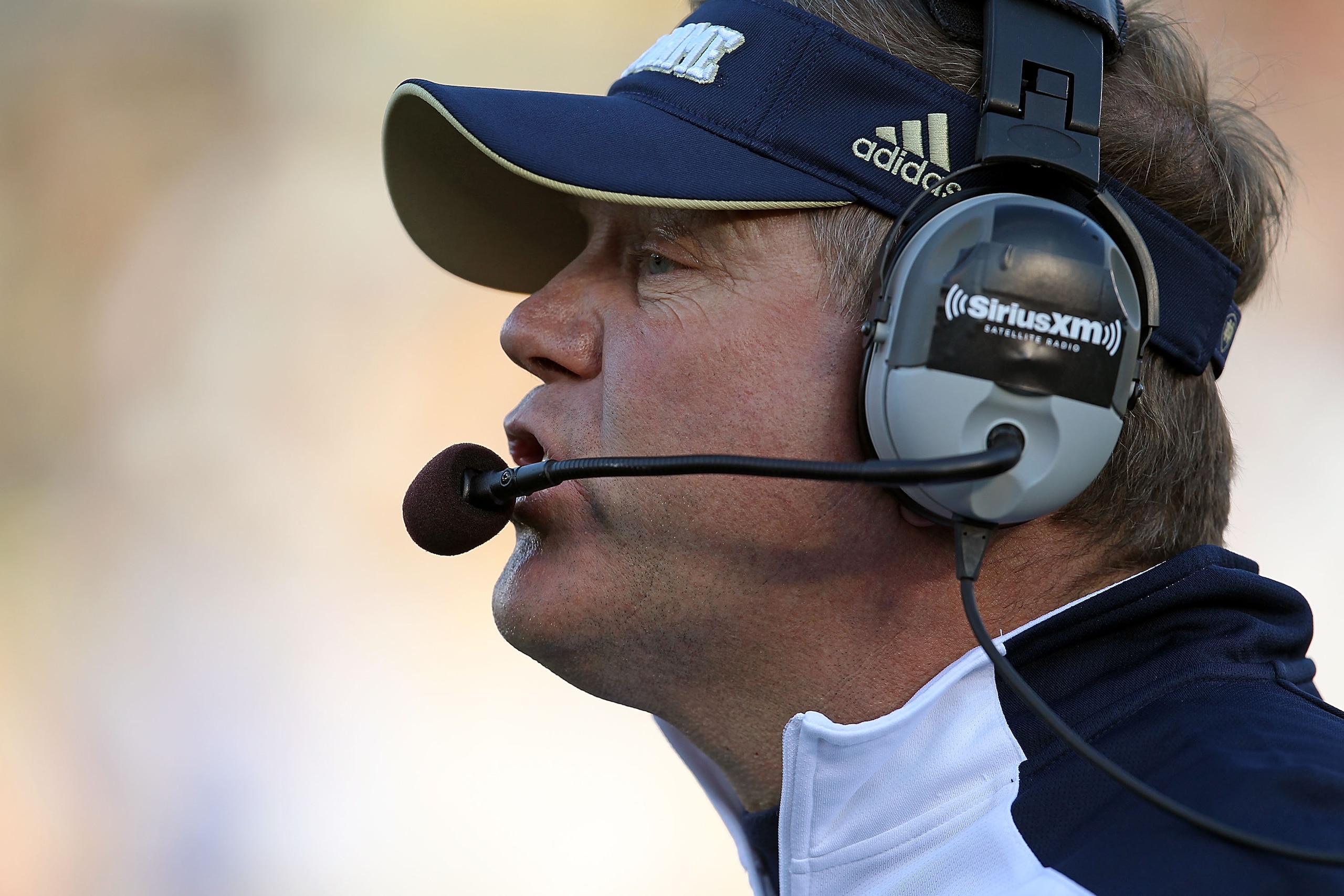 SOUTH BEND, IN - OCTOBER 30: Head coach Brian Kelly of the Notre Dame Fighting Irish watches as his team takes on the Tulsa Golden Hurricane at Notre Dame Stadium on October 30, 2010 in South Bend, Indiana. Tulsa defeated Notre Dame 28-27. (Photo by Jonat
