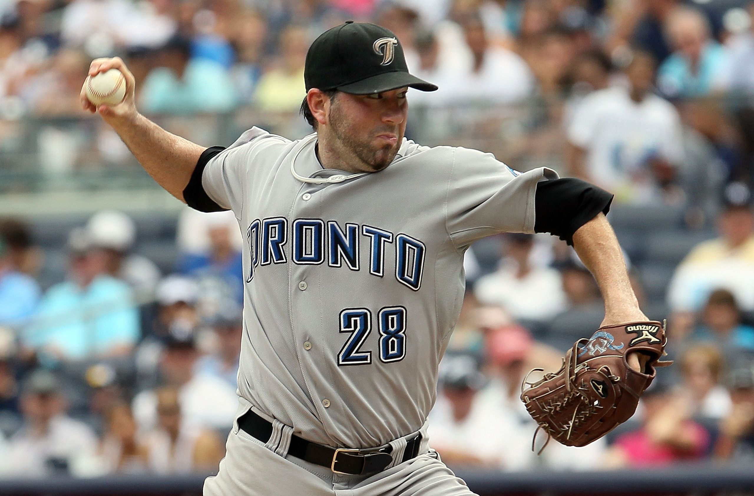 NEW YORK - AUGUST 04:  Shaun Marcum #28 of the Toronto Blue Jays delivers a pitch against the New York Yankees on August 4, 2010 at Yankee Stadium in the Bronx borough of New York City.  (Photo by Jim McIsaac/Getty Images)