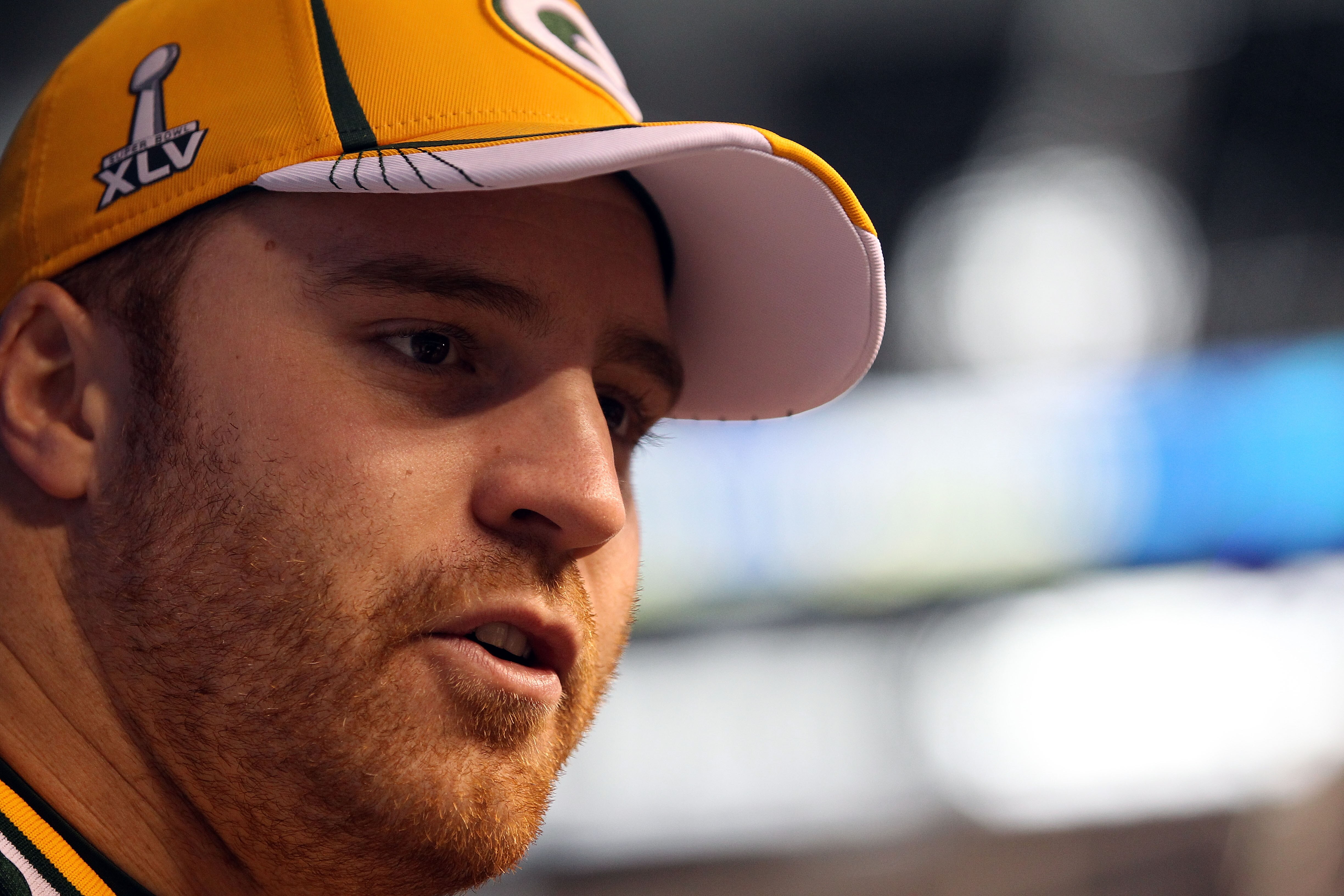 ARLINGTON, TX - FEBRUARY 01:  John Kuhn #30 of the Green Bay Packers addresses the media during Super Bowl XLV Media Day ahead of Super Bowl XLV at Cowboys Stadium on February 1, 2011 in Arlington, Texas. The Pittsburgh Steelers will play the Green Bay Pa