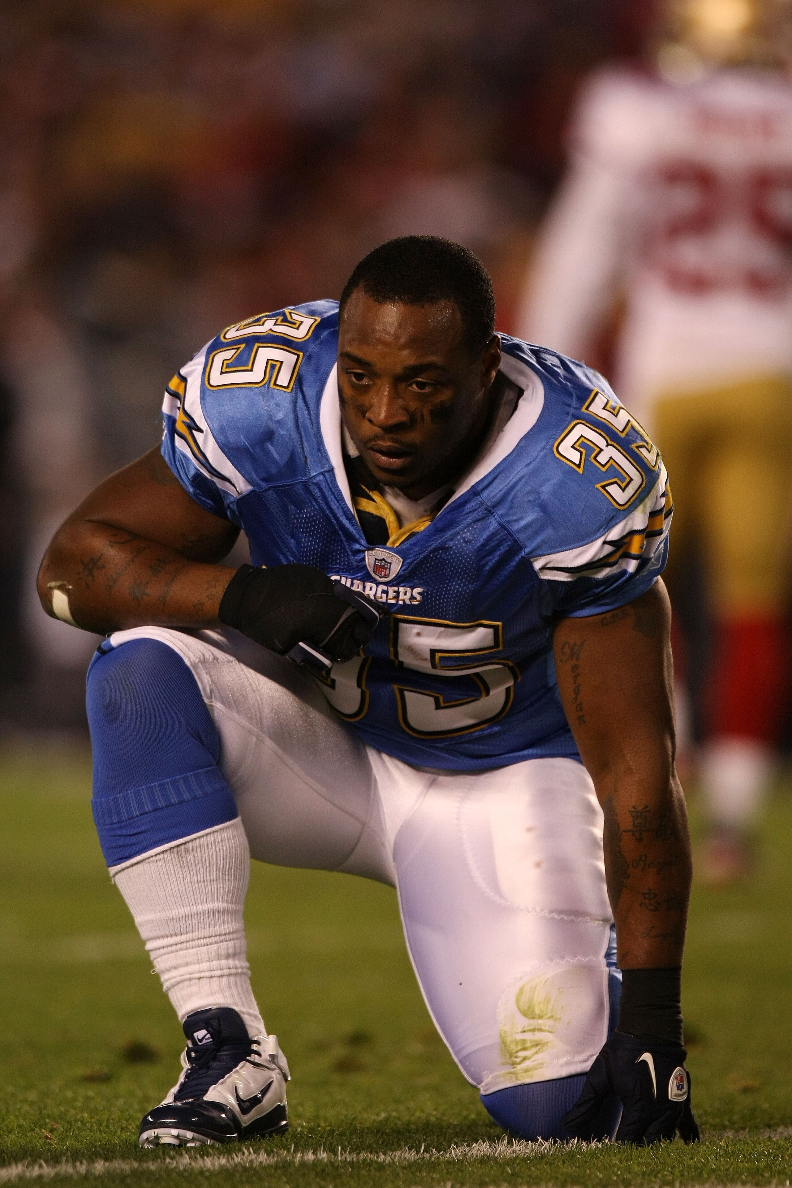 SAN DIEGO, CA - DECEMBER 16:  Running back Mike Tolbert #35 of the San Diego Chargers reacts after being hit during a punt return by the San Francisco 49ers at Qualcomm Stadium on December 16, 2010 in San Diego, California.  (Photo by Donald Miralle/Getty