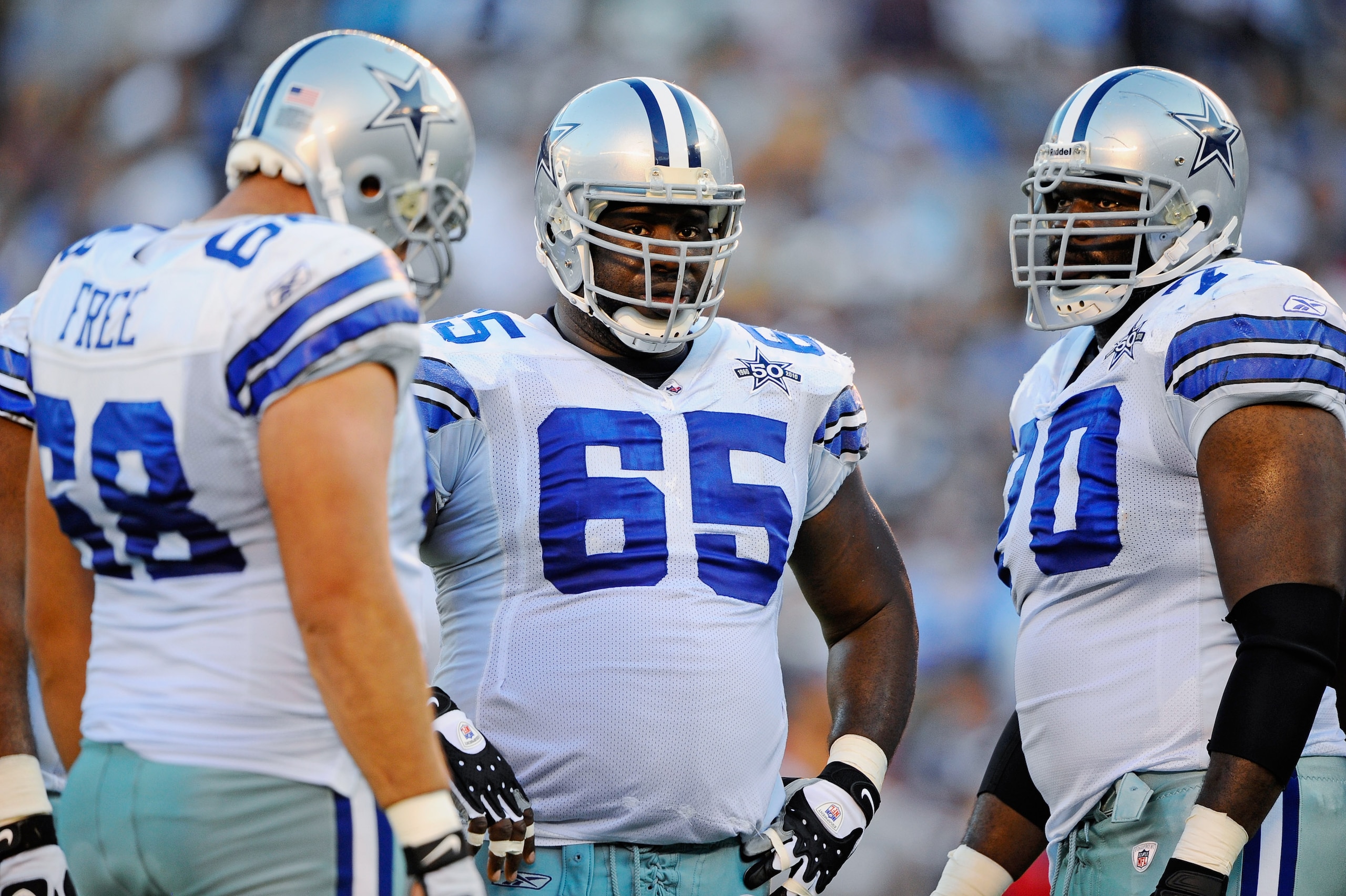 SAN DIEGO - AUGUST 21:  Doug Free #68, Andre Gurode #65 and Leonard Davis #70 of the Dallas Cowboys in action during the pre-season NFL football game against San Diego Chargers at Qualcomm Stadium on August 21, 2010 in San Diego, California.  (Photo by Ke