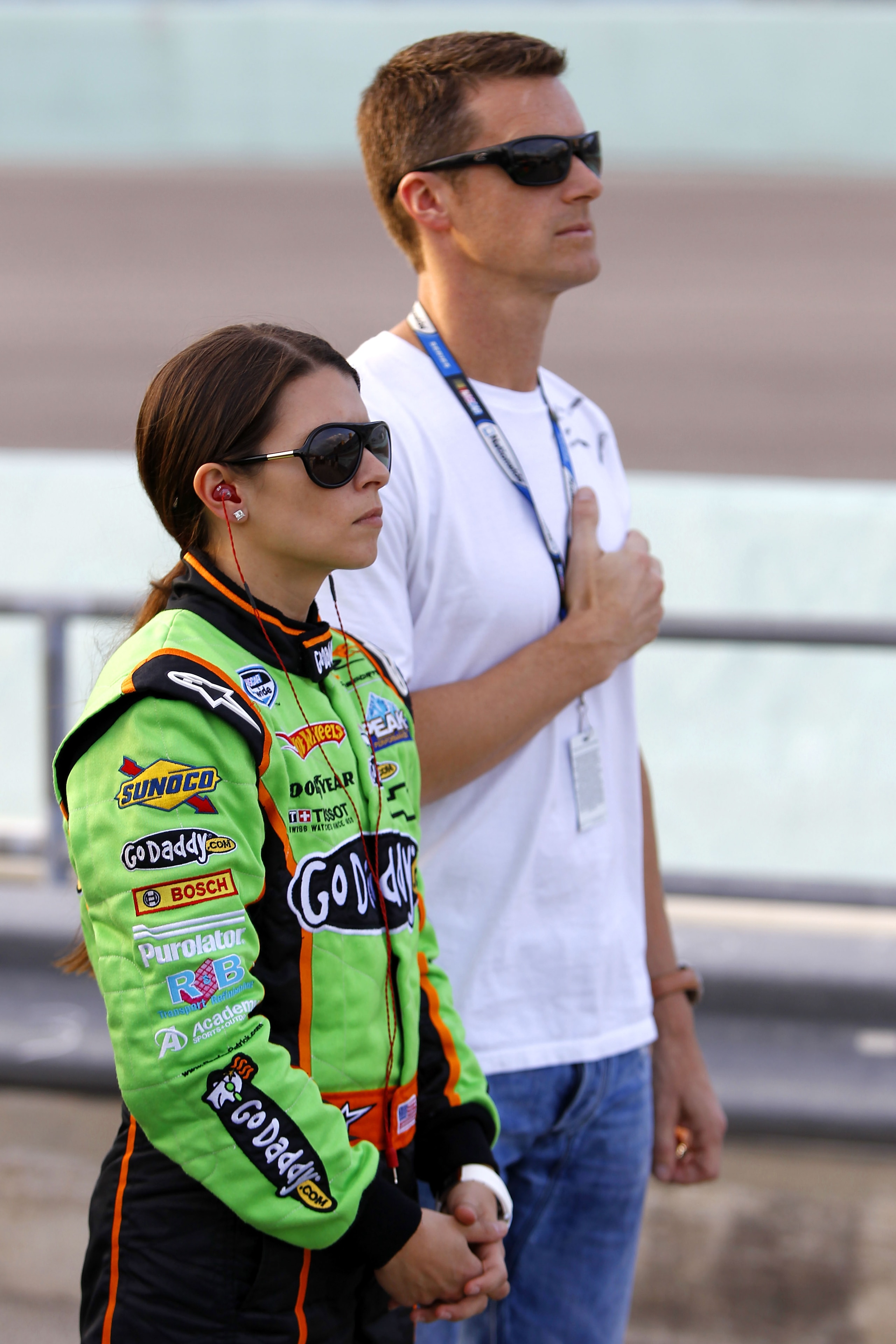 HOMESTEAD, FL - NOVEMBER 20:  Danica Patrick, driver of the #7 GoDaddy.com Chevrolet, stands with her husband Paul Hospenthal prior to the NASCAR Nationwide Series Ford 300 at Homestead-Miami Speedway on November 20, 2010 in Homestead, Florida.  (Photo by