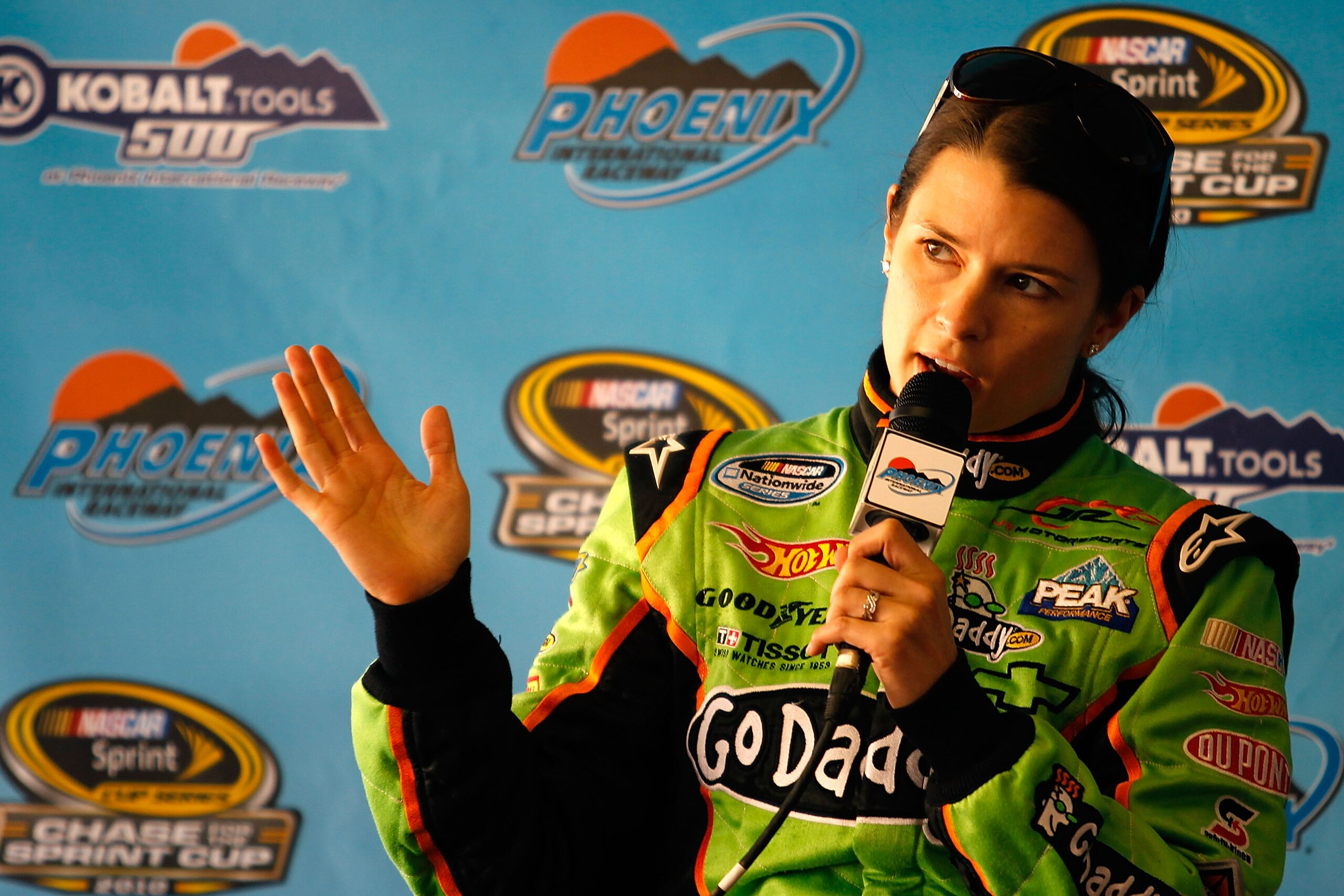 AVONDALE, AZ - NOVEMBER 12:  Danica Patrick, driver of the #7 GoDaddy.com Chevrolet, speaks during a press conference prior to practice for the NASCAR Nationwide Series WYPALL 200 at Phoenix International Raceway on November 12, 2010 in Avondale, Arizona.