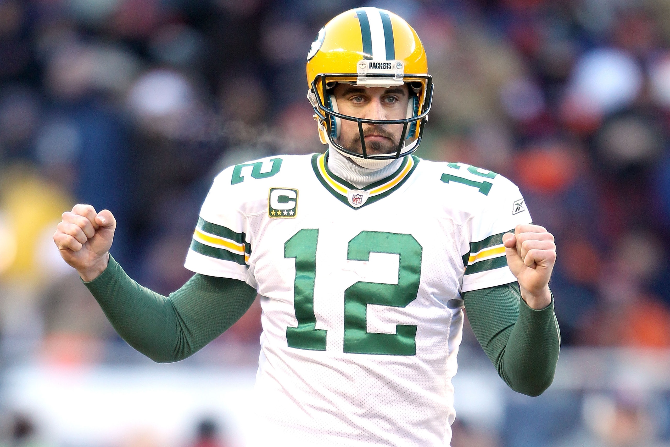 CHICAGO, IL - JANUARY 23: Quarterback Aaron Rodgers #12 of the Green Bay Packers reacts in the third quarter against the Chicago Bears in the NFC Championship Game at Soldier Field on January 23, 2011 in Chicago, Illinois. (Photo by Andy Lyons/Getty Ima CHICAGO, IL - JANUARY 23: Quarterback Aaron Rodgers #12 of the Green Bay Packers reacts in the third quarter against the Chicago Bears in the NFC Championship Game at Soldier Field on January 23, 2011 in Chicago, Illinois. (Photo by Andy Lyons/Getty Ima