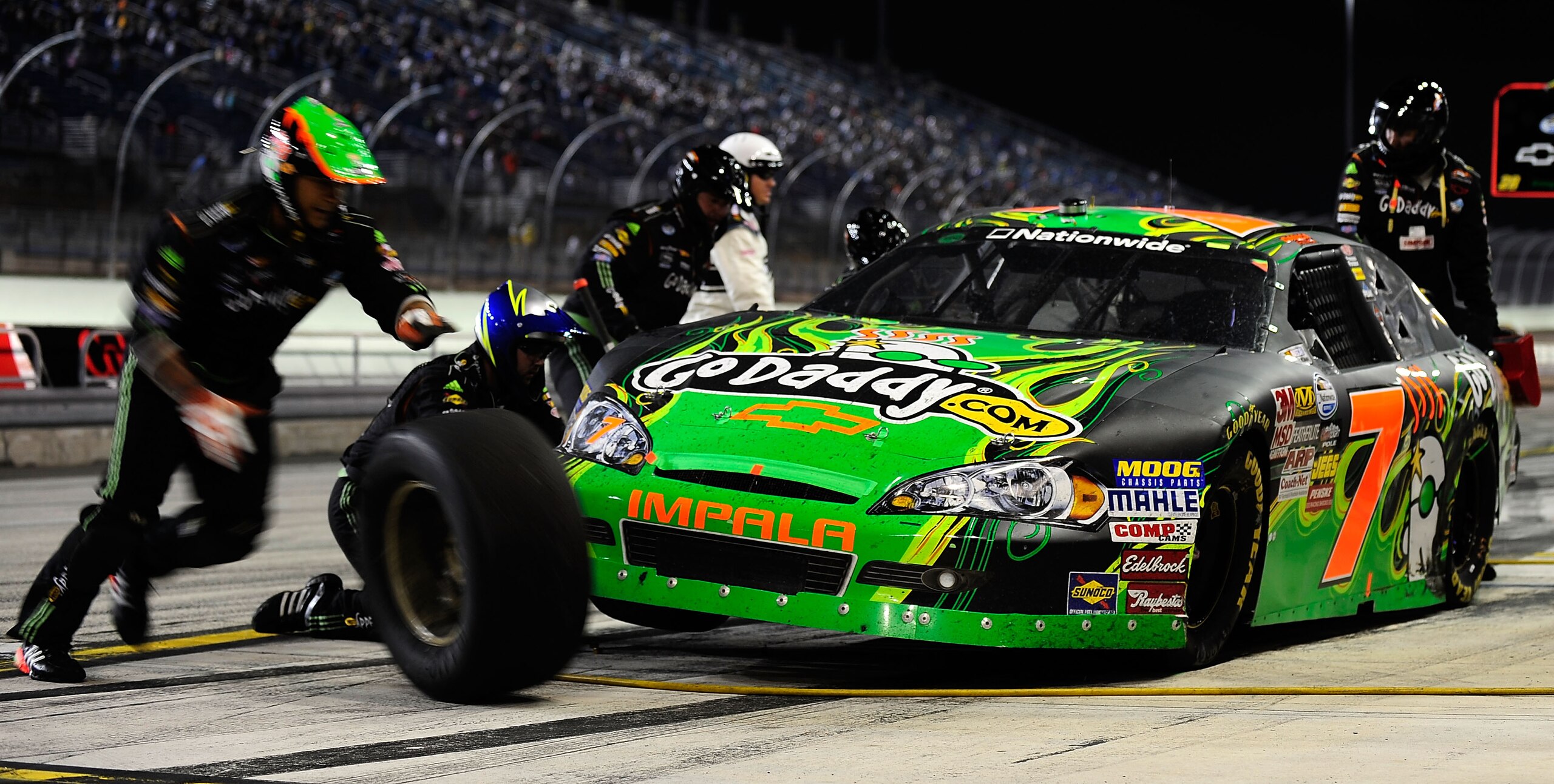 HOMESTEAD, FL - NOVEMBER 20:  Danica Patrick, driver of the #7 GoDaddy.com Chevrolet, makes a pit stop during the NASCAR Nationwide Series Ford 300 at Homestead-Miami Speedway on November 20, 2010 in Homestead, Florida.  (Photo by Rusty Jarrett/Getty Imag