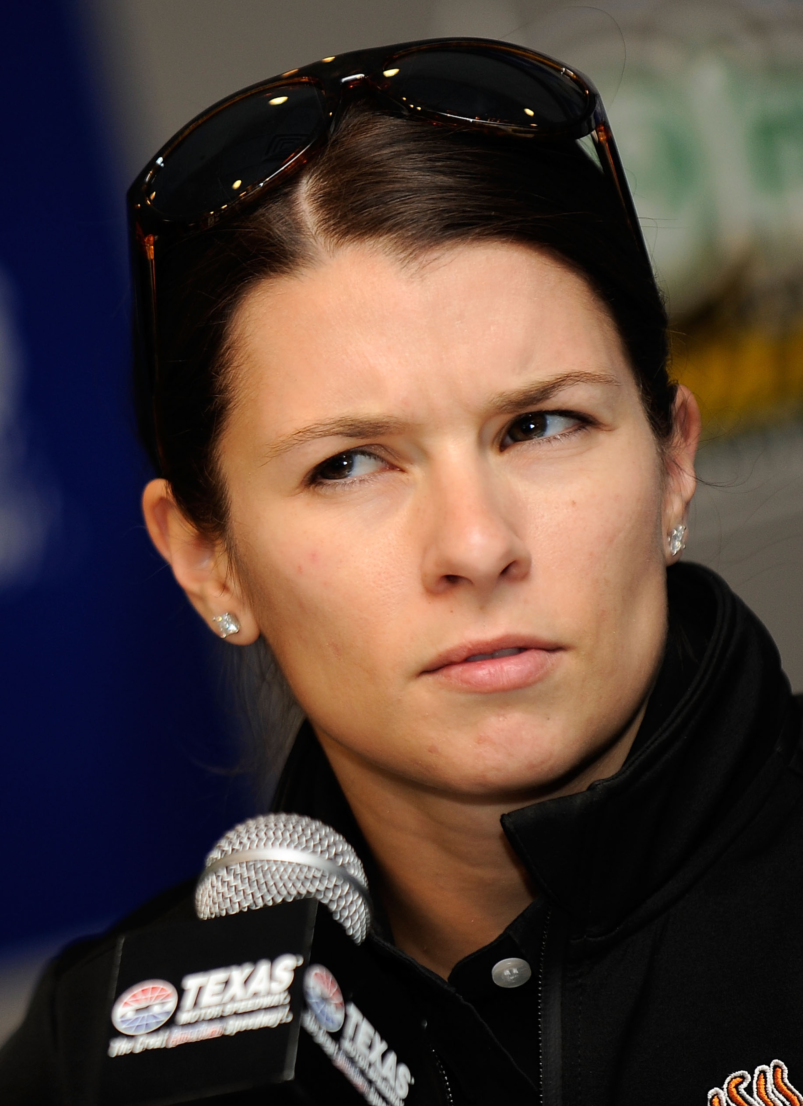 FORT WORTH, TX - NOVEMBER 05:  Danica Patrick, driver of the #7 GoDaddy.com Chevrolet, speaks to the media after practice for the NASCAR Nationwide Series O'Reilly Auto Parts Challenge at Texas Motor Speedway on November 5, 2010 in Fort Worth, Texas.  (Ph
