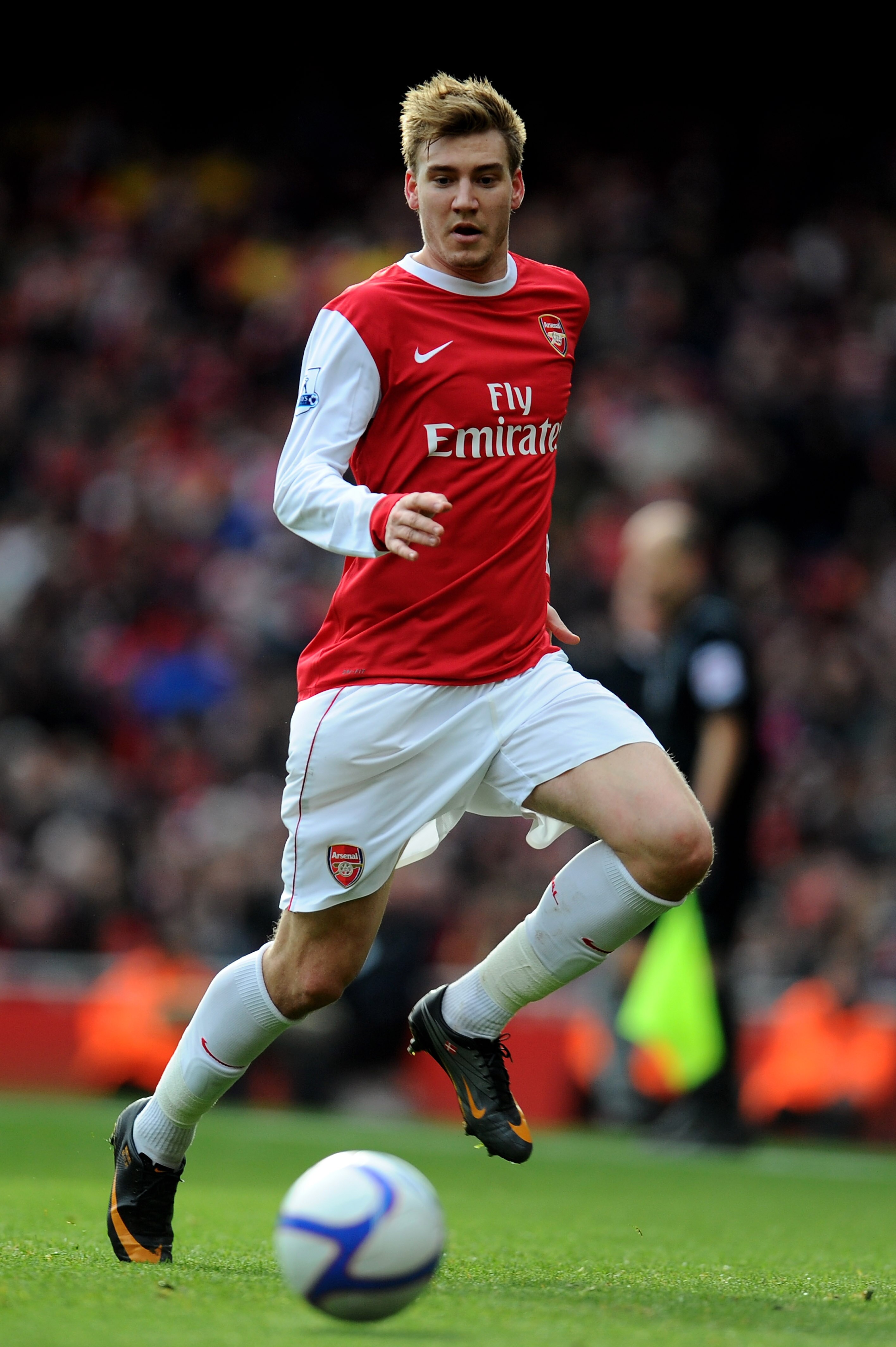 LONDON, ENGLAND - JANUARY 30:  Nicklas Bendtner of Arsenal runs with the ball during the FA Cup sponsored by E.ON fourth round match between Arsenal and Huddersfield Town at The Emirates Stadium on January 30, 2011 in London, England.  (Photo by Clive Mas