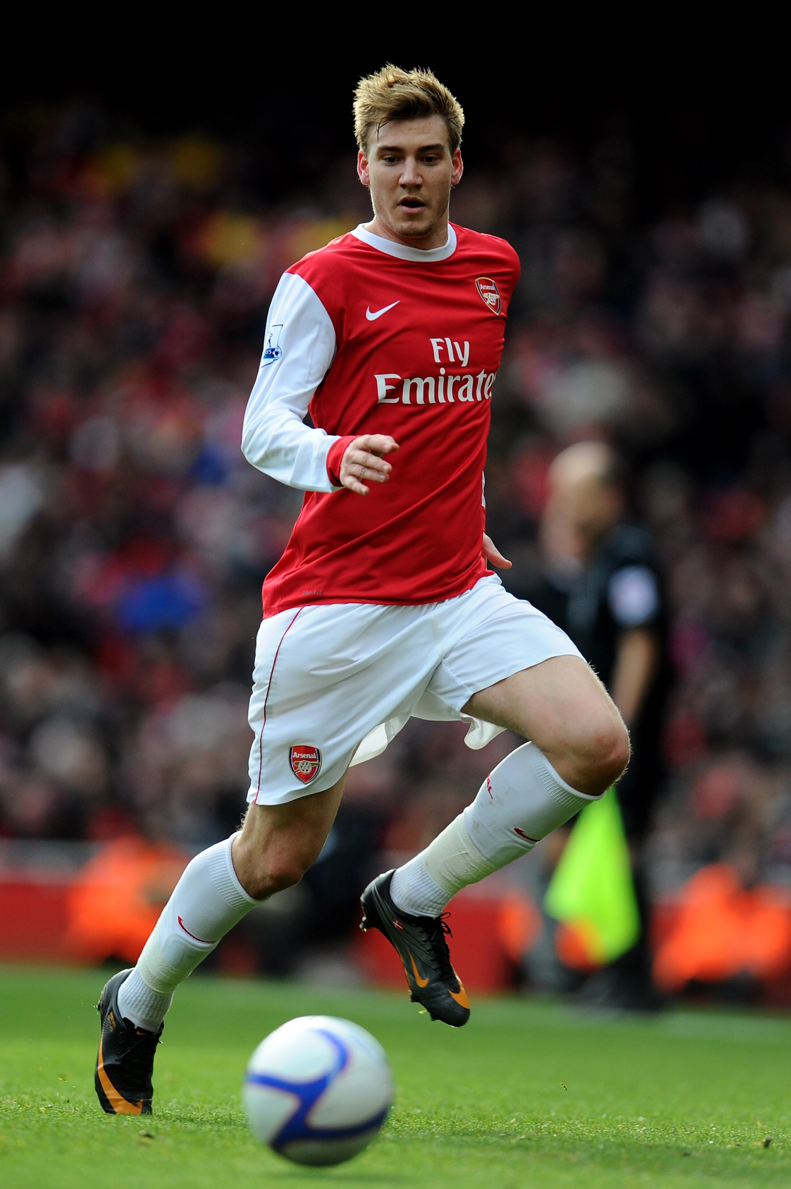 LONDON, ENGLAND - JANUARY 30: Nicklas Bendtner of Arsenal runs with the ball during the FA Cup sponsored by E.ON fourth round match between Arsenal and Huddersfield Town at The Emirates Stadium on January 30, 2011 in London, England. (Photo by Clive Mas LONDON, ENGLAND - JANUARY 30: Nicklas Bendtner of Arsenal runs with the ball during the FA Cup sponsored by E.ON fourth round match between Arsenal and Huddersfield Town at The Emirates Stadium on January 30, 2011 in London, England. (Photo by Clive Mas