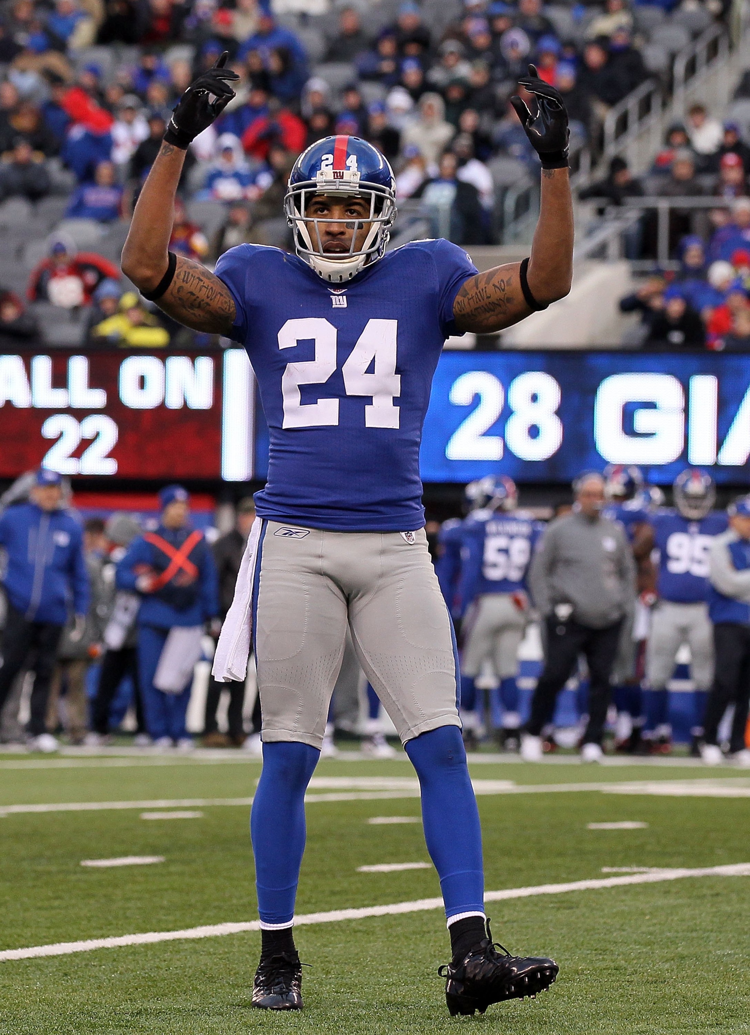 EAST RUTHERFORD, NJ - DECEMBER 05:  Terrell Thomas #24 of the New York Giants fires up the crowd against the Washington Redskins on December 5, 2010 at the New Meadowlands Stadium in East Rutherford, New Jersey. The Giants defeated the Redskins 31-7.  (Ph