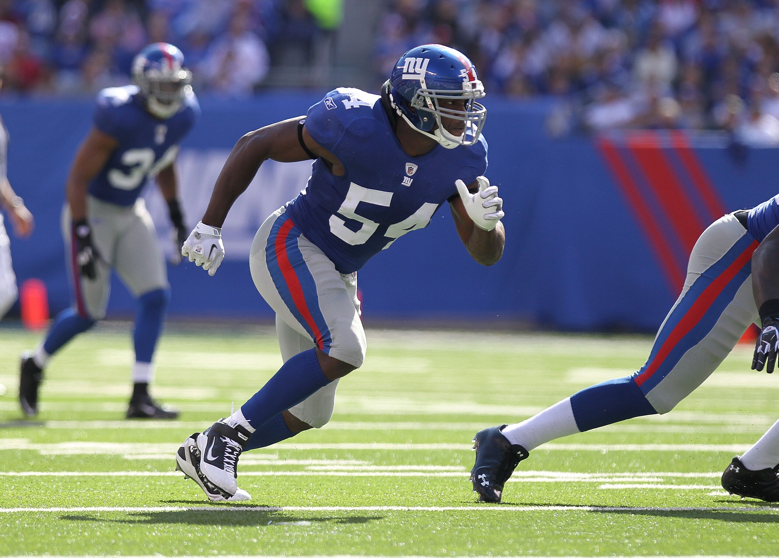 EAST RUTHERFORD, NJ - OCTOBER 17:  Jonathan Goff #54  of the New York Giants against the Detroit Lions at New Meadowlands Stadium on October 17, 2010 in East Rutherford, New Jersey.  (Photo by Nick Laham/Getty Images)