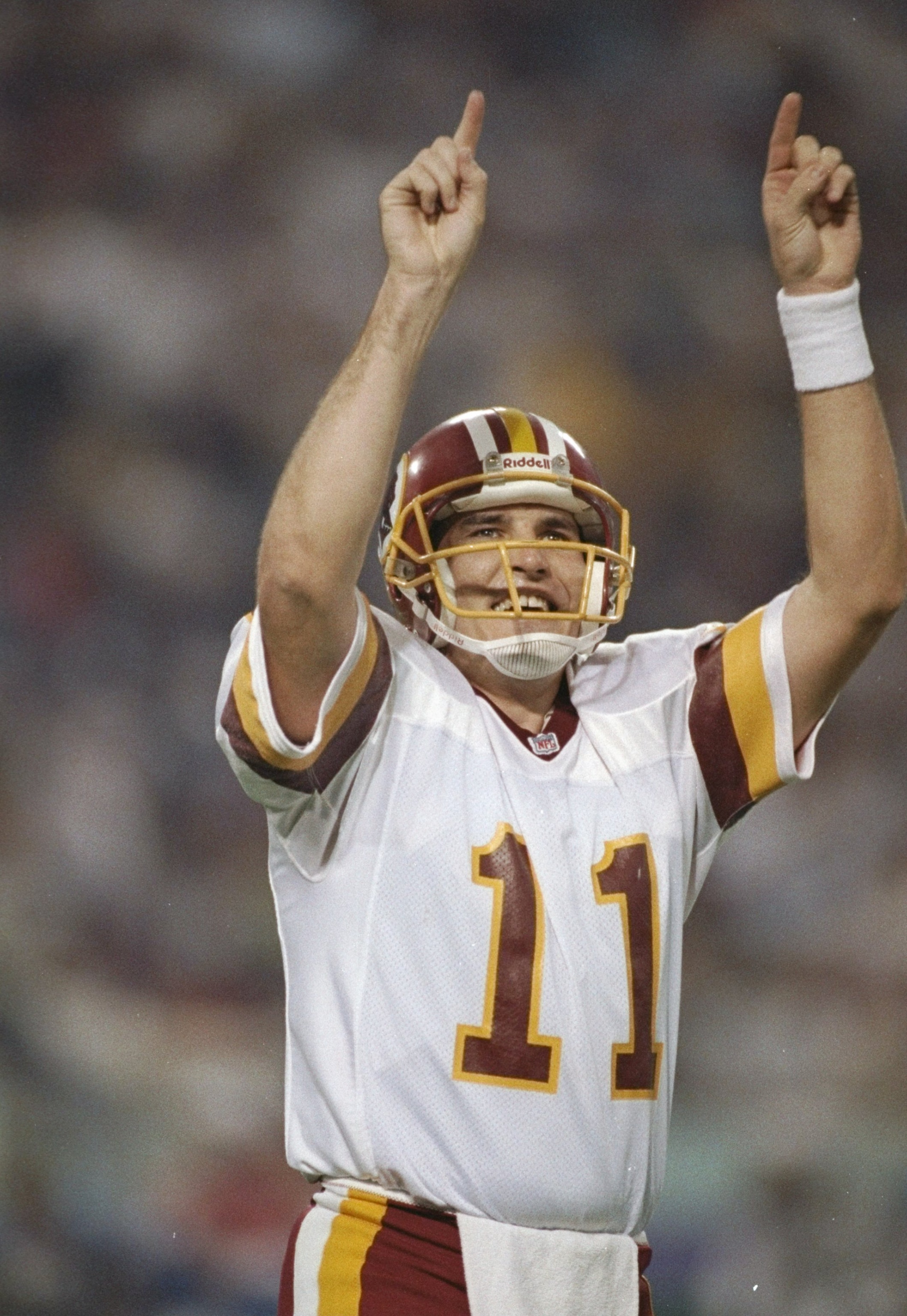 26 Jan 1992: Quarterback Mark Rypien of the Washington Redskins celebrates during Super Bowl XXVI against the Buffalo Bills at the Hubert H. Humphrey Metrodome in Minneapolis, Minnesota. The Reskins won the game, 37-24. Rypien was named the game''s MVP 26 Jan 1992: Quarterback Mark Rypien of the Washington Redskins celebrates during Super Bowl XXVI against the Buffalo Bills at the Hubert H. Humphrey Metrodome in Minneapolis, Minnesota. The Reskins won the game, 37-24. Rypien was named the game''s MVP