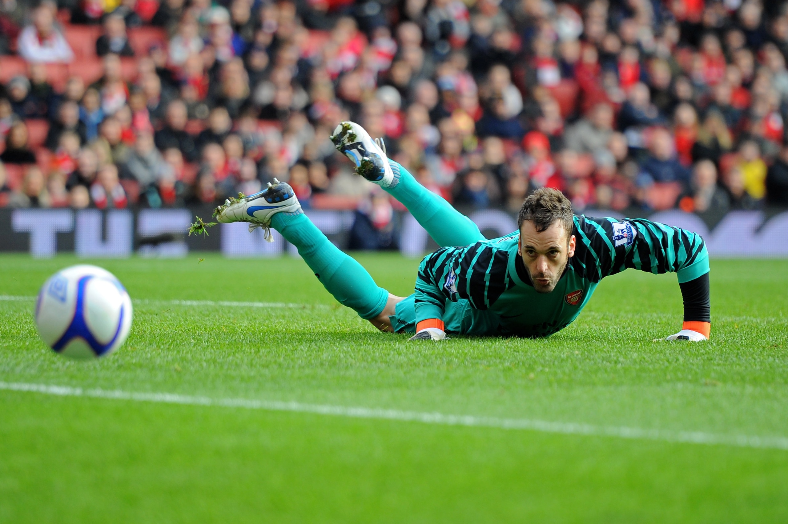 LONDON, ENGLAND - JANUARY 30: A relieved Manuel Almunia of Arsenal looks on as a shot on his goal goes wide during the FA Cup sponsored by E.ON fourth round match between Arsenal and Huddersfield Town at The Emirates Stadium on January 30, 2011 in London LONDON, ENGLAND - JANUARY 30: A relieved Manuel Almunia of Arsenal looks on as a shot on his goal goes wide during the FA Cup sponsored by E.ON fourth round match between Arsenal and Huddersfield Town at The Emirates Stadium on January 30, 2011 in London