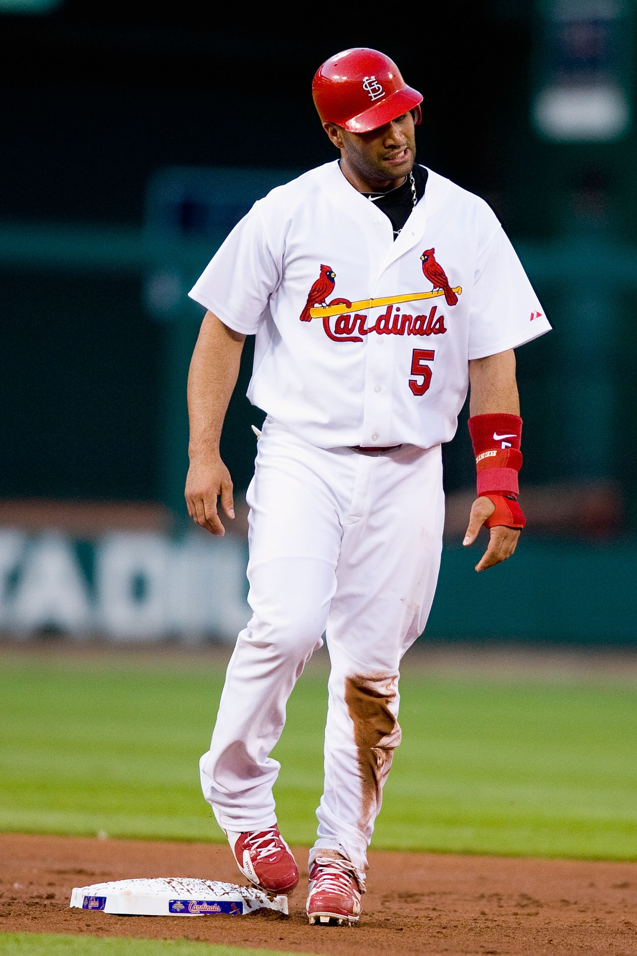 ST. LOUIS - MAY 18:  Albert Pujols #5 of the St. Louis Cardinals reacts to being picked off at second base in action against the Washington Nationals at Busch Stadium on May 18, 2010 in St. Louis, Missouri.  The Cardinals beat the Nationals 3-2.  (Photo b