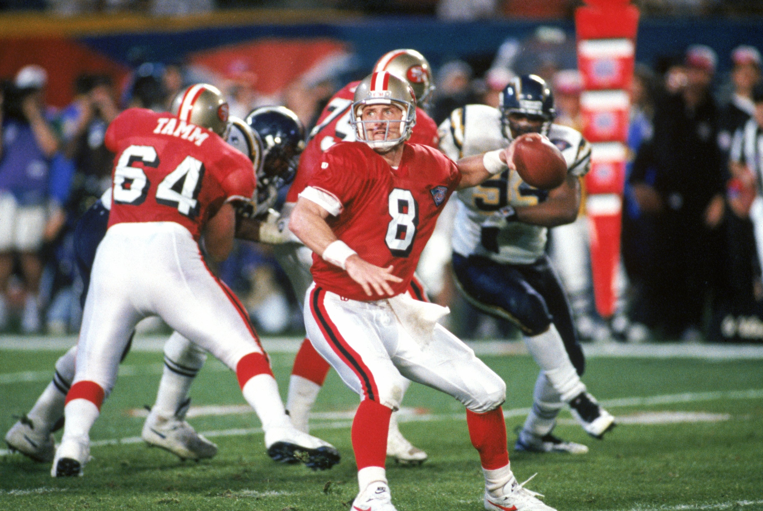 MIAMI - JANUARY 29: Quarterback Steve Young #8 of the San Francisco 49ers drops back to pass during Super Bowl XXIX against the San Diego Chargers at Joe Robbie Stadium on January 29, 1995 in Miami, Florida. The 49ers won 49-26. (Photo by George Rose/Get MIAMI - JANUARY 29: Quarterback Steve Young #8 of the San Francisco 49ers drops back to pass during Super Bowl XXIX against the San Diego Chargers at Joe Robbie Stadium on January 29, 1995 in Miami, Florida. The 49ers won 49-26. (Photo by George Rose/Get