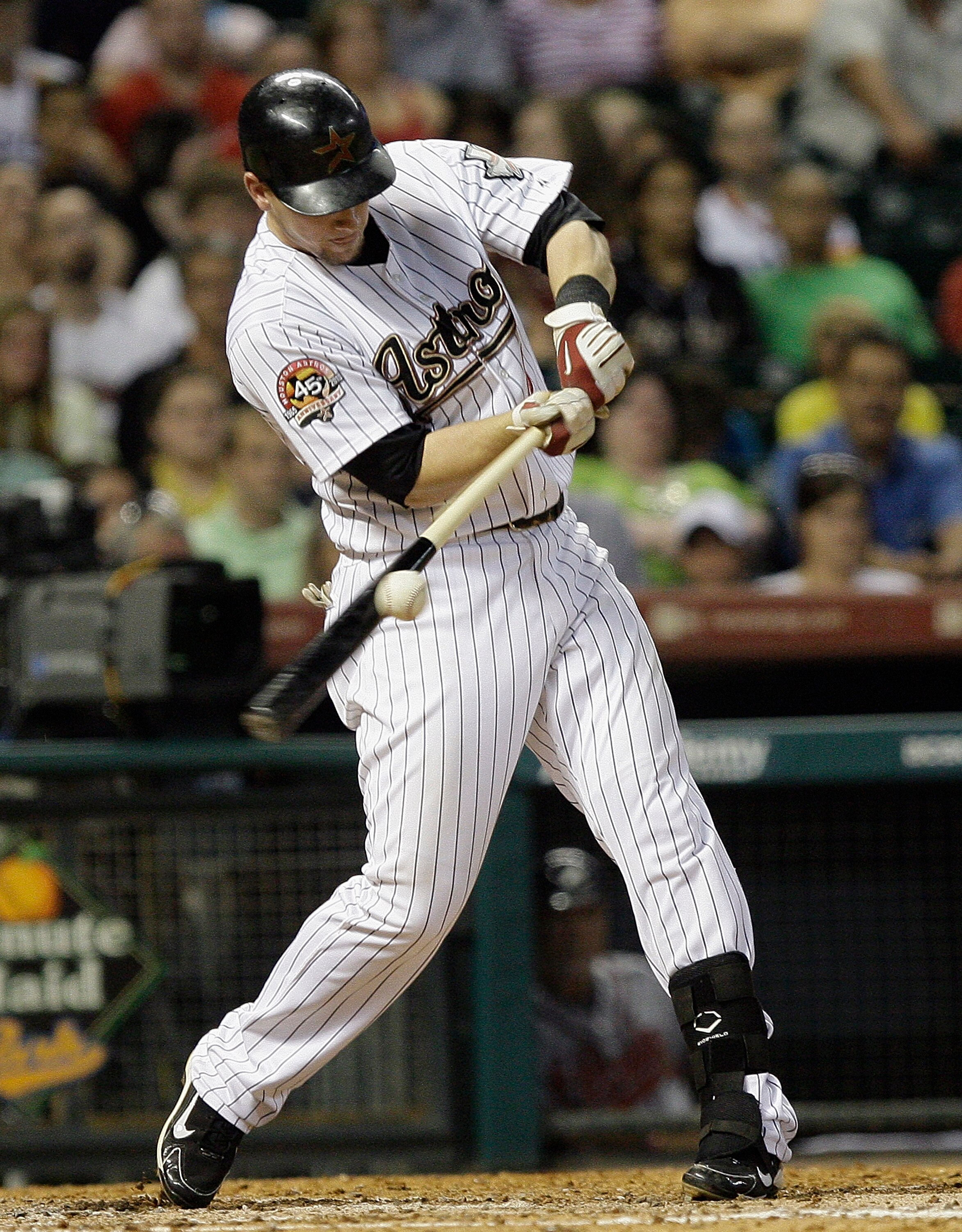 HOUSTON - AUGUST 10:  Chris Johnson #23 of the Houston Astros shatters his bat as he singles to right field against the Atlanta Braves at Minute Maid Park on August 10, 2010 in Houston, Texas.  (Photo by Bob Levey/Getty Images)