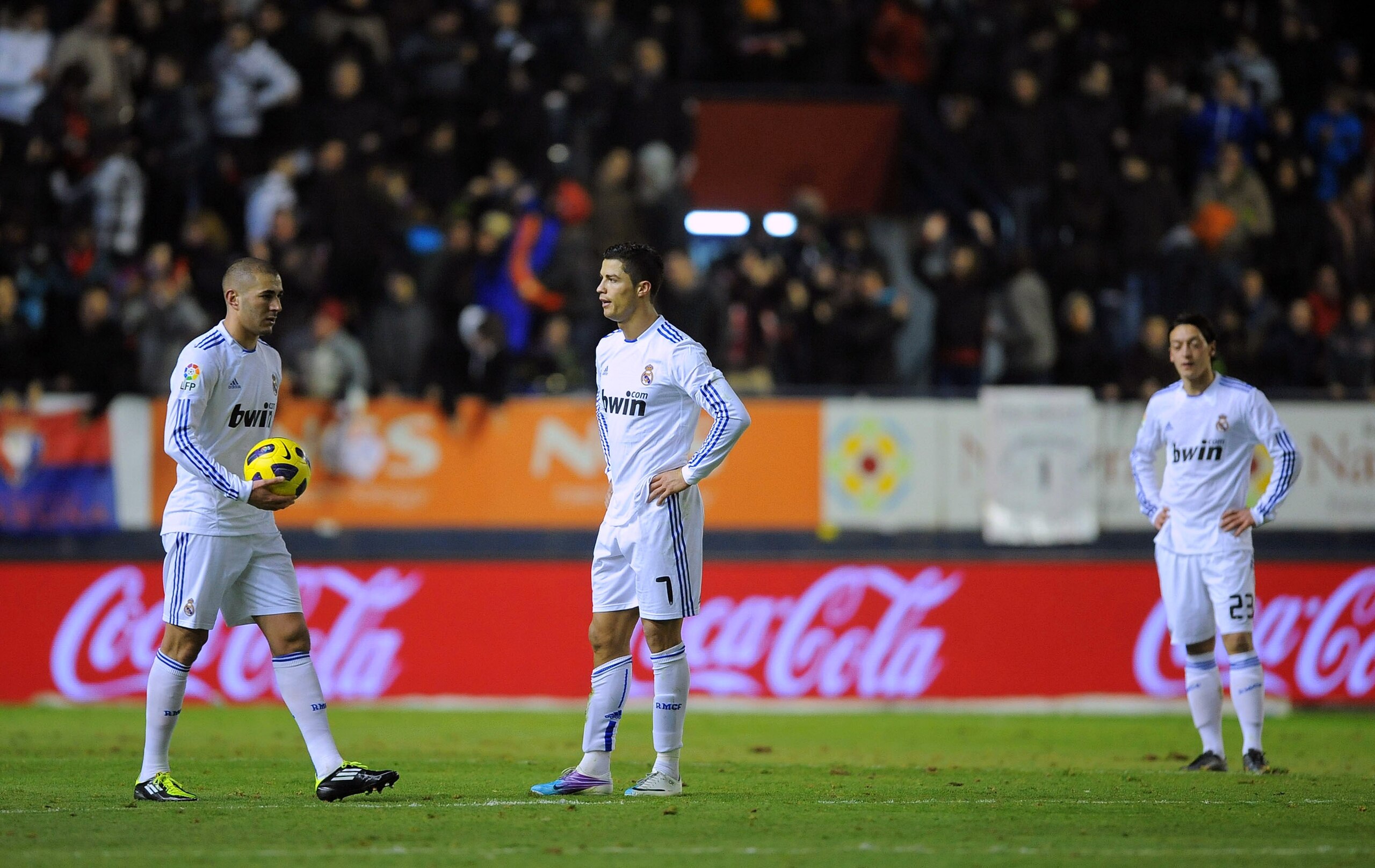 PAMPLONA, SPAIN - JANUARY 30:  Cristiano Ronaldo (R) and Karim Benzema of Real Madrid show their dejection after CA Osasuna scored a goal during the La Liga match between CA Osasuna and Real Madrid at Estadio Reyno de Navarra on January 30, 2011 in Pamplo