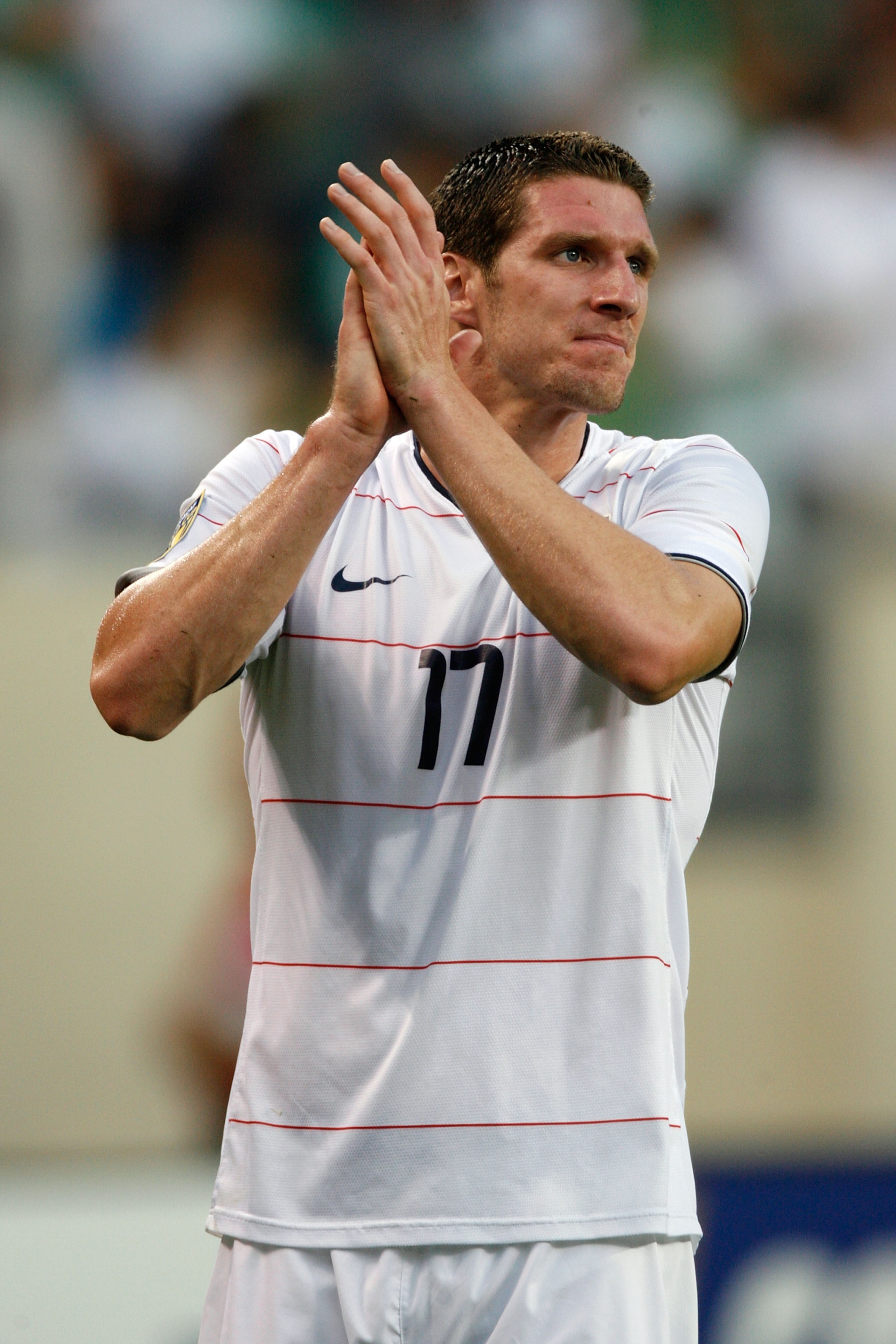 CHICAGO - JULY 23:  Kenny Cooper #17 of the USA celebrates after USA won 2-0 against Honduras during their CONCACAF Cup Semifinal match at Soldier Field on July 23, 2009 in Chicago, Illinois.  (Photo by Brian Kersey/Getty Images)