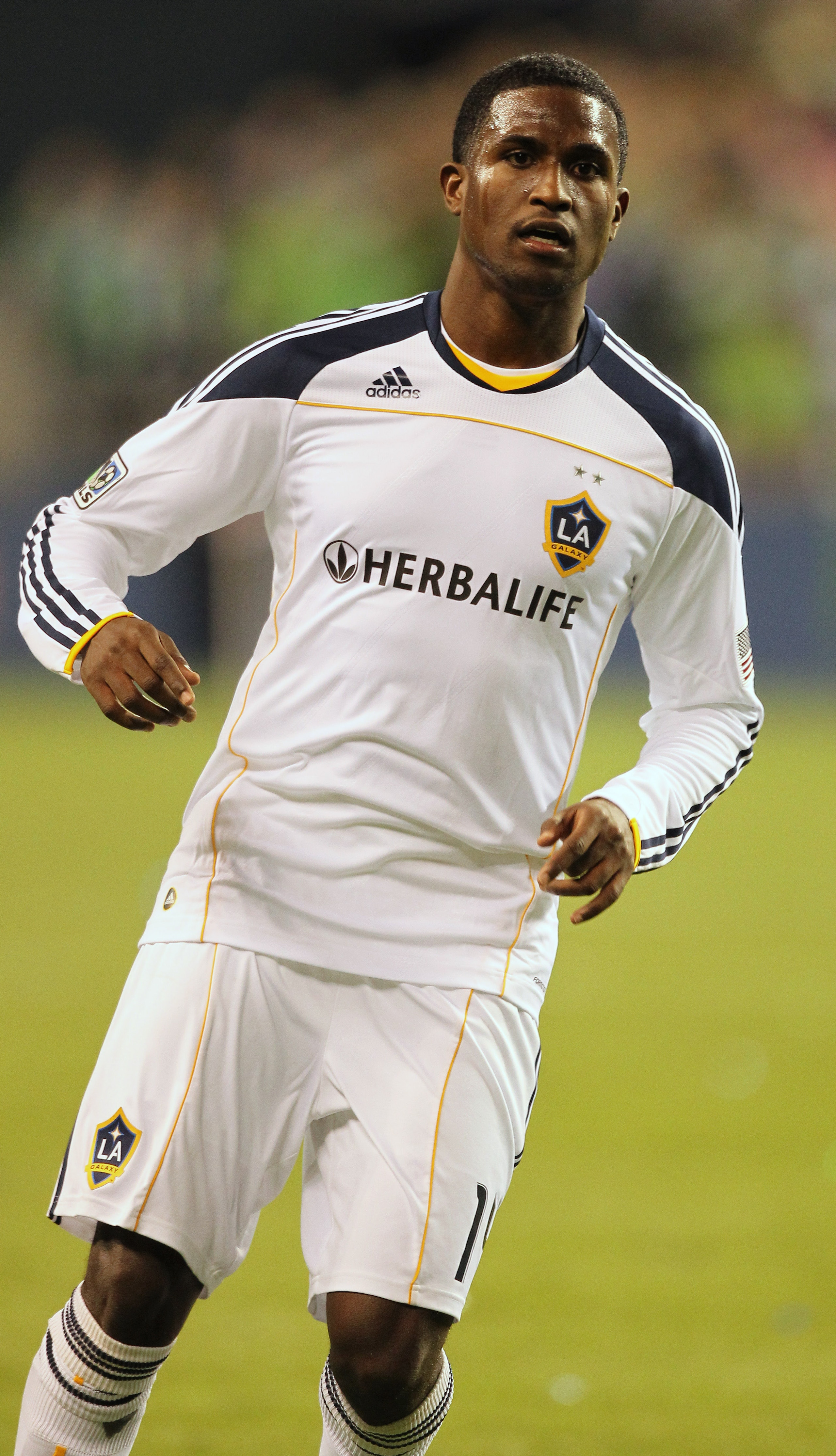 SEATTLE, WA - OCTOBER 31:  Edson Buddle #14 of the Los Angeles Galaxy follows the play against the Seattle Sounders FC during the 1st leg playoff game at Qwest Field on October 31, 2010 in Seattle, Washington. (Photo by Otto Greule Jr/Getty Images)