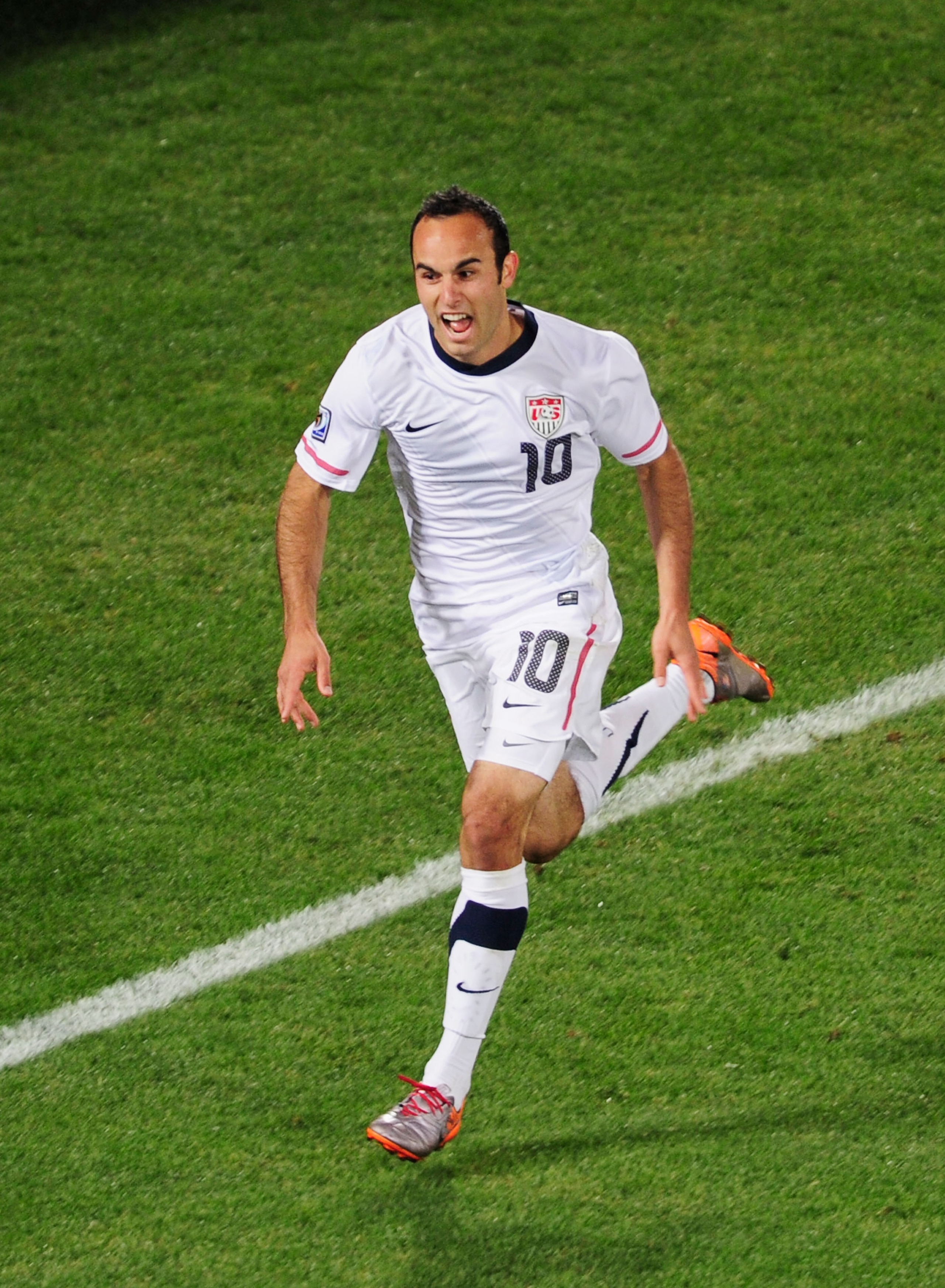 PRETORIA, SOUTH AFRICA - JUNE 23:  Landon Donovan of the United States celebrates scoring the winning goal that sends the USA through to the second round during the 2010 FIFA World Cup South Africa Group C match between USA and Algeria at the Loftus Versf