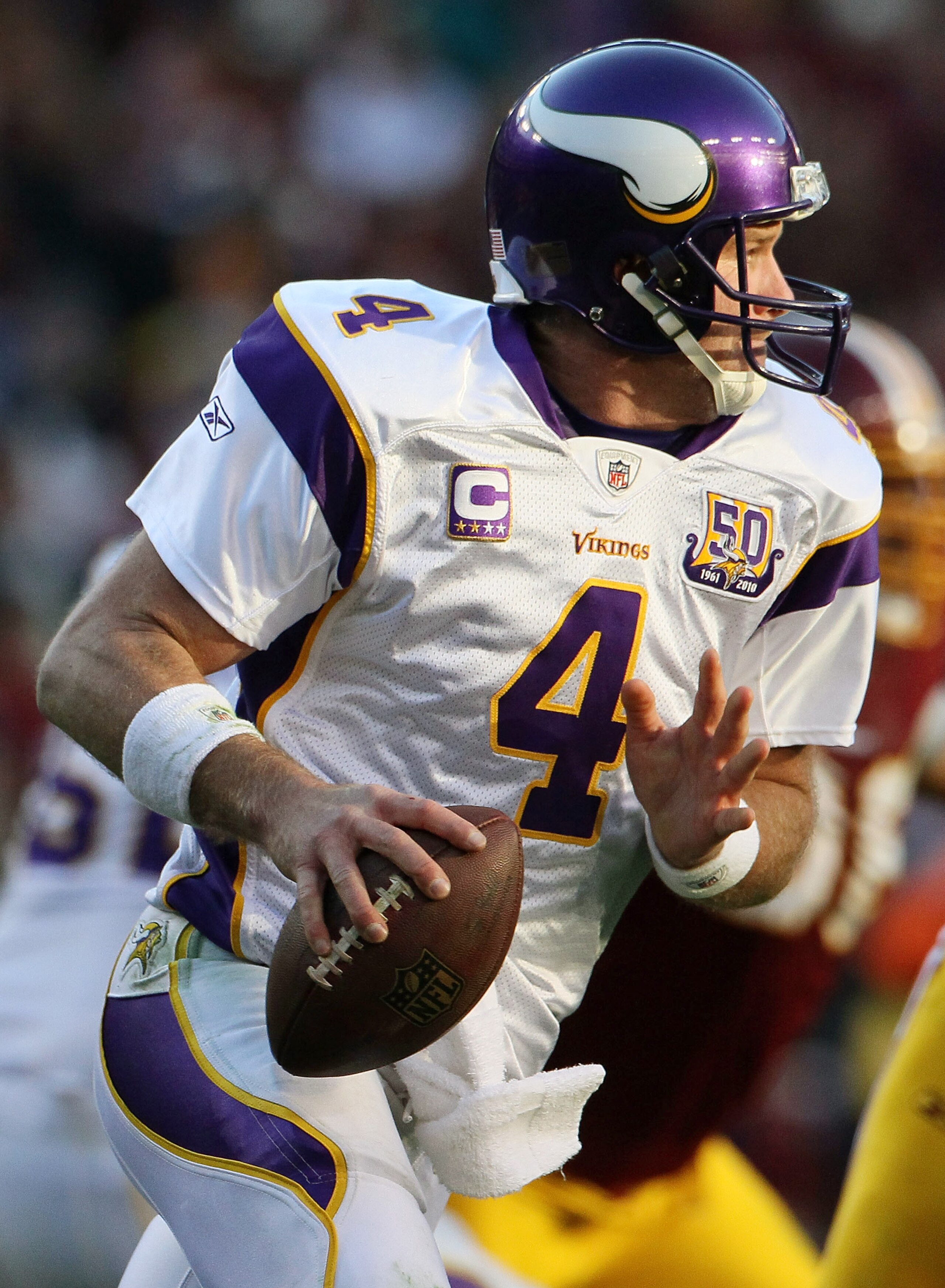 LANDOVER, MD - NOVEMBER 28: Brett Favre #4 of the Minnesota Vikings scrambles against the Washington Redskins at FedExField November 28, 2010 in Landover, Maryland. The Vikings won the game 17-13. (Photo by Win McNamee/Getty Images) LANDOVER, MD - NOVEMBER 28: Brett Favre #4 of the Minnesota Vikings scrambles against the Washington Redskins at FedExField November 28, 2010 in Landover, Maryland. The Vikings won the game 17-13. (Photo by Win McNamee/Getty Images)